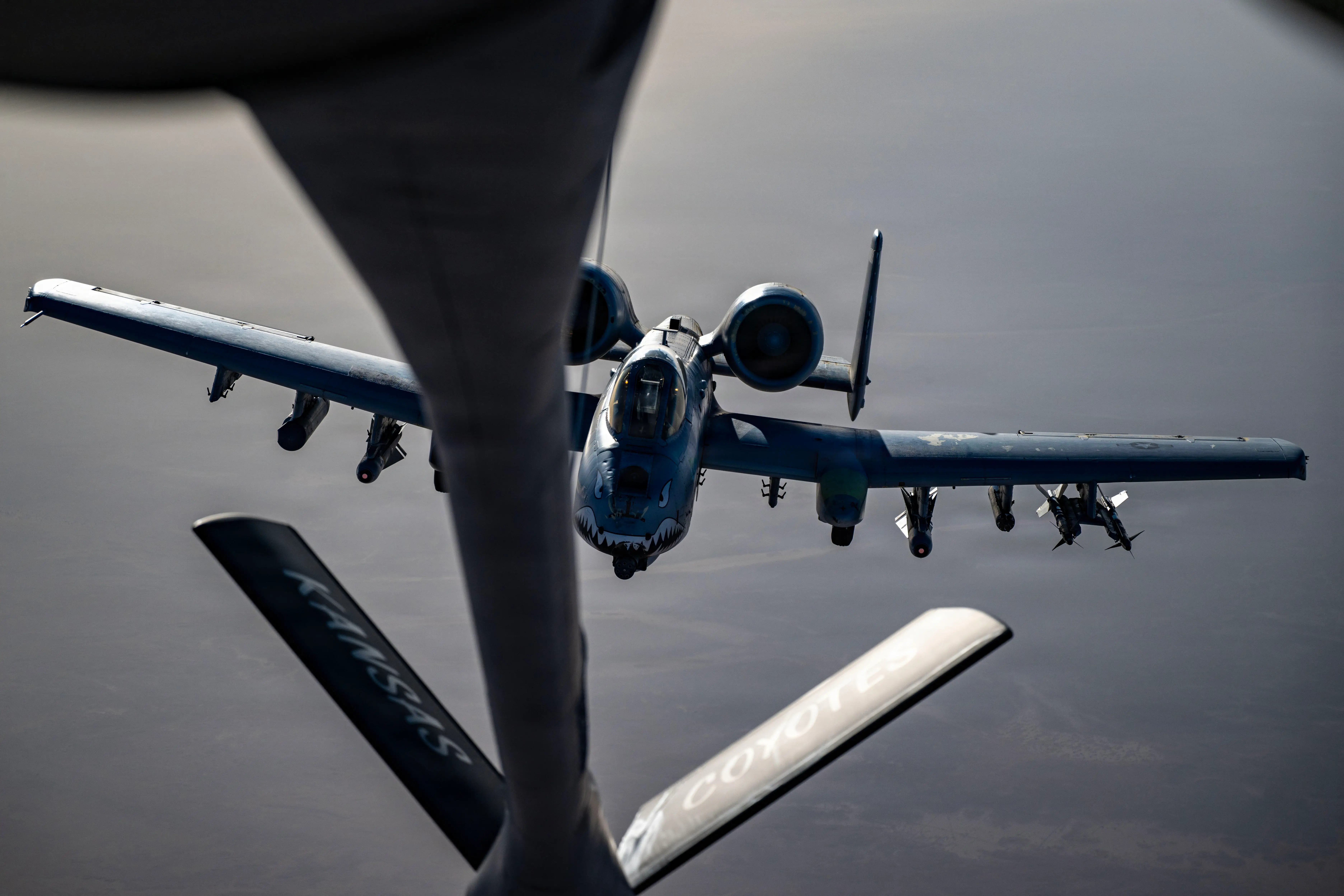 A-10 Warthog flying behind a refueling aircraft in the skies above Iran.