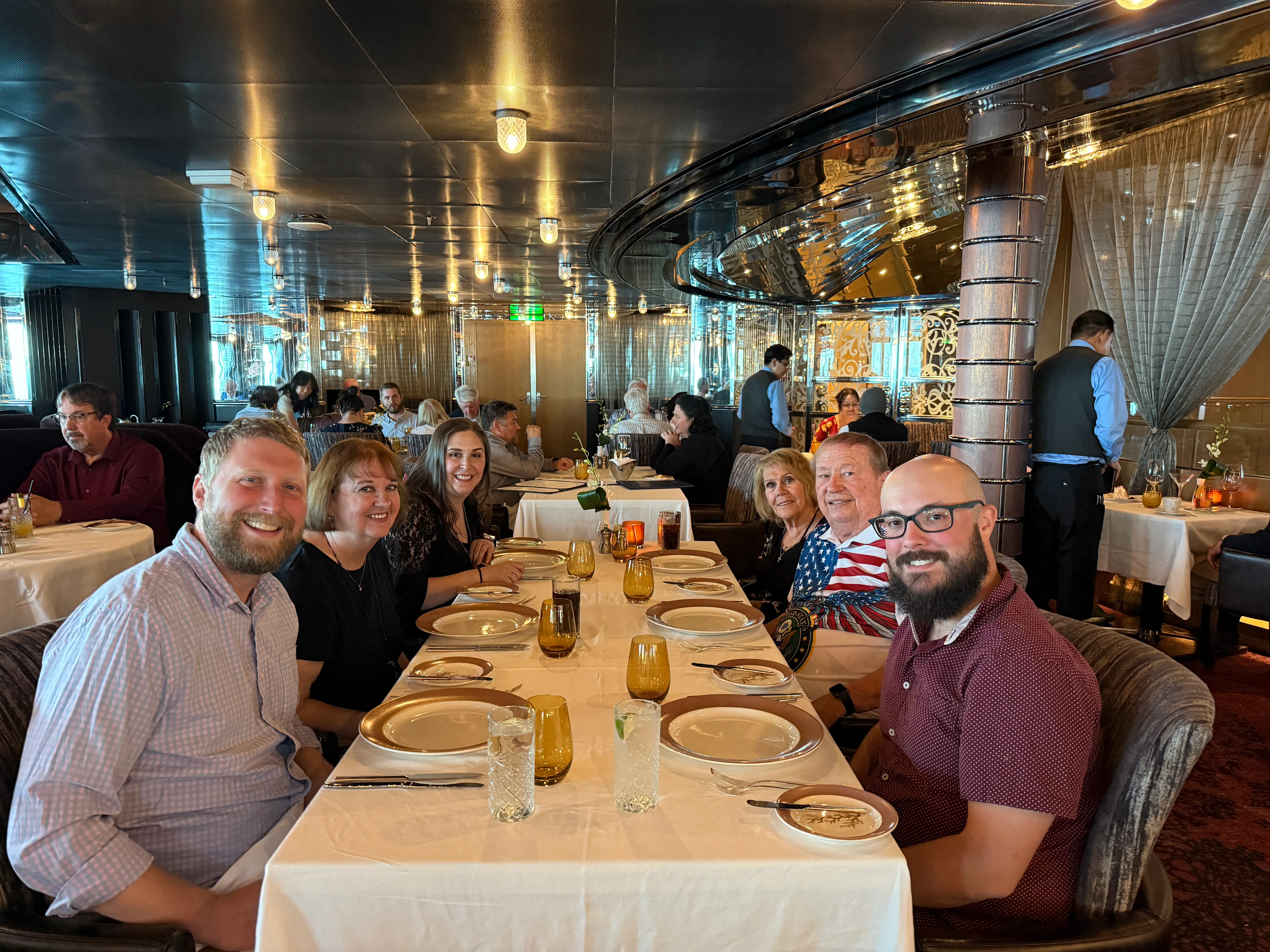 group of people sitting at large table
