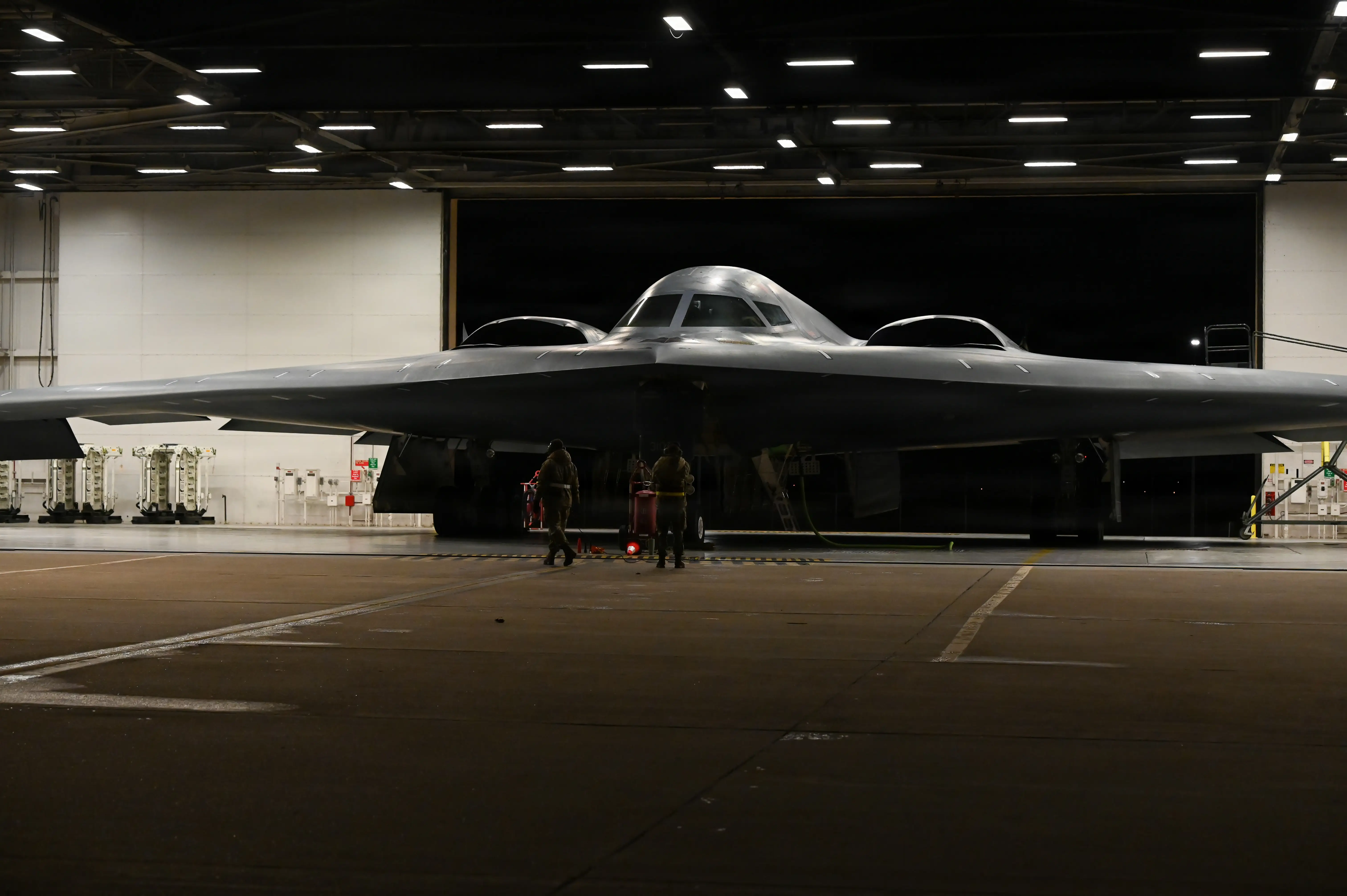 US Air Force crew chiefs perform pre-flight checks on a B-2 Spirit stealth bomber during Operation Epic Fury, March 17, 2026.