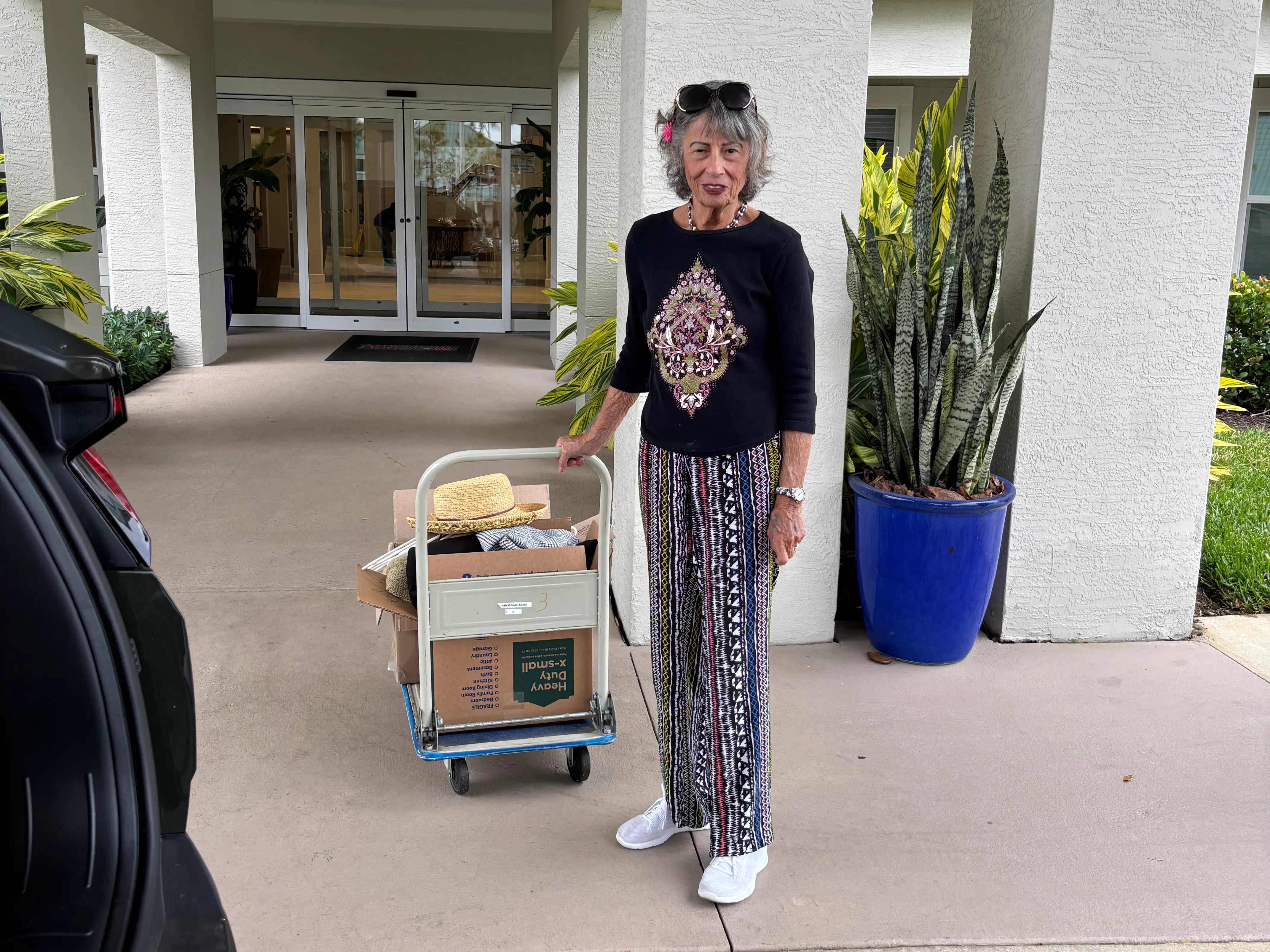 Woman moving into assisted facility
