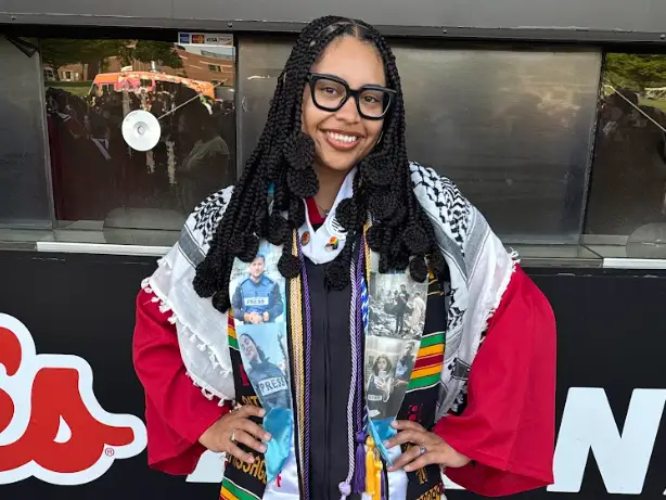 Nicolette Alexandra Brito-Cruz dressed in her graduation gown