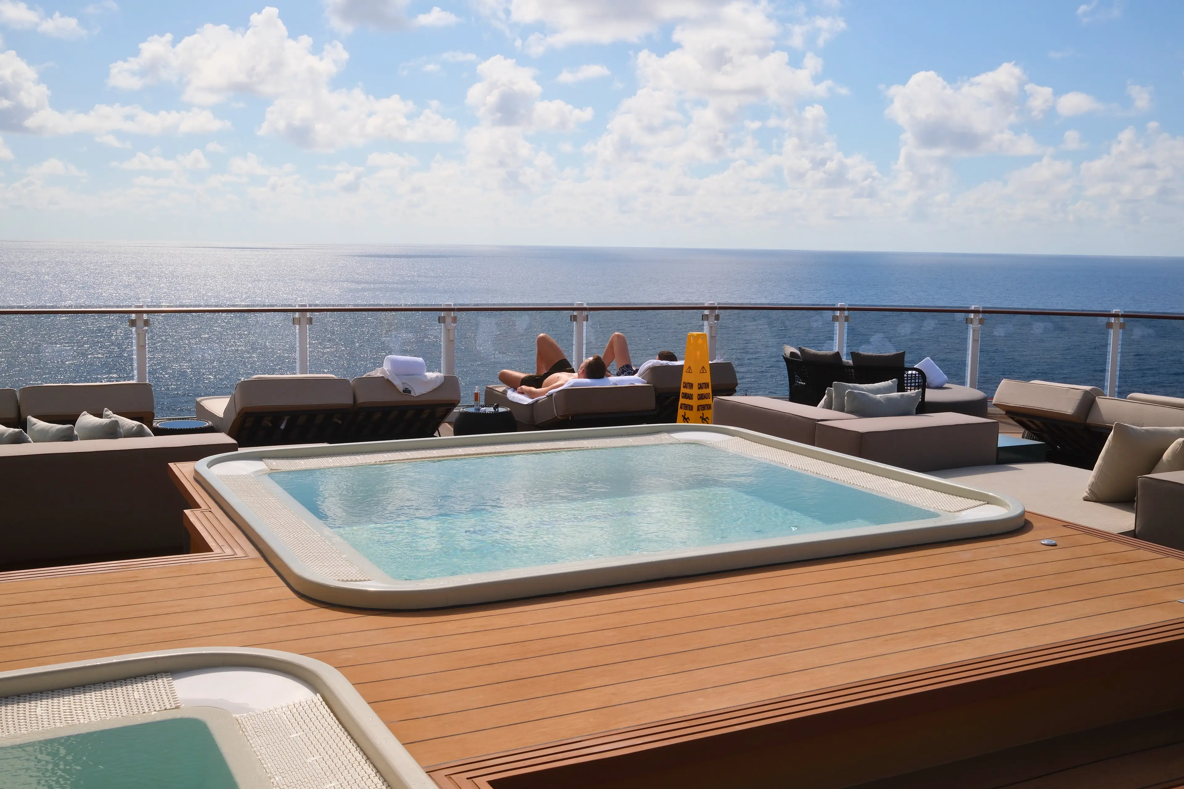 Hot tub on deck overlooking ocean on Norwegian Luna