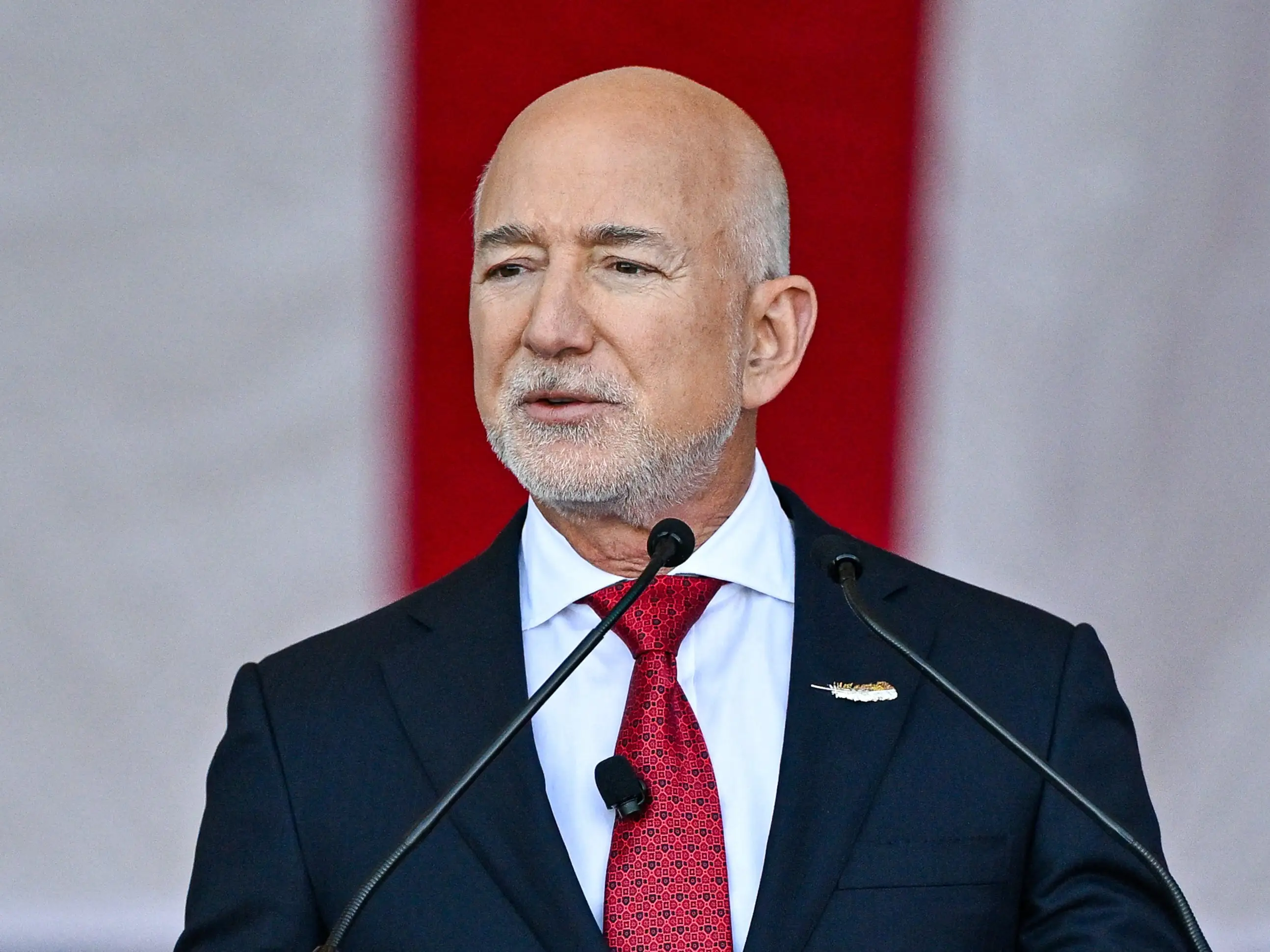 Blue Origin CEO Jeff Bezos speaks onstage ahead of US Defense Secretary Pete Hegseth at Blue Origin in Cape Canaveral, Florida, on February 2, 2026.