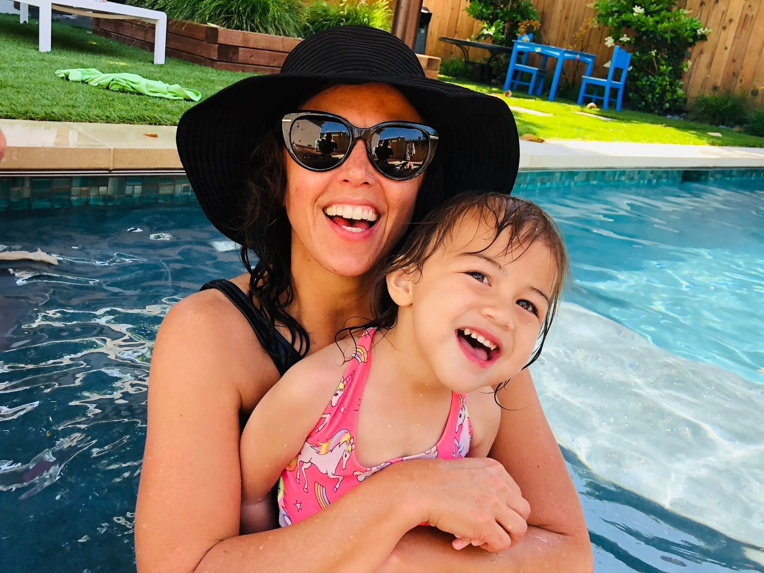 mom and daughter in pool
