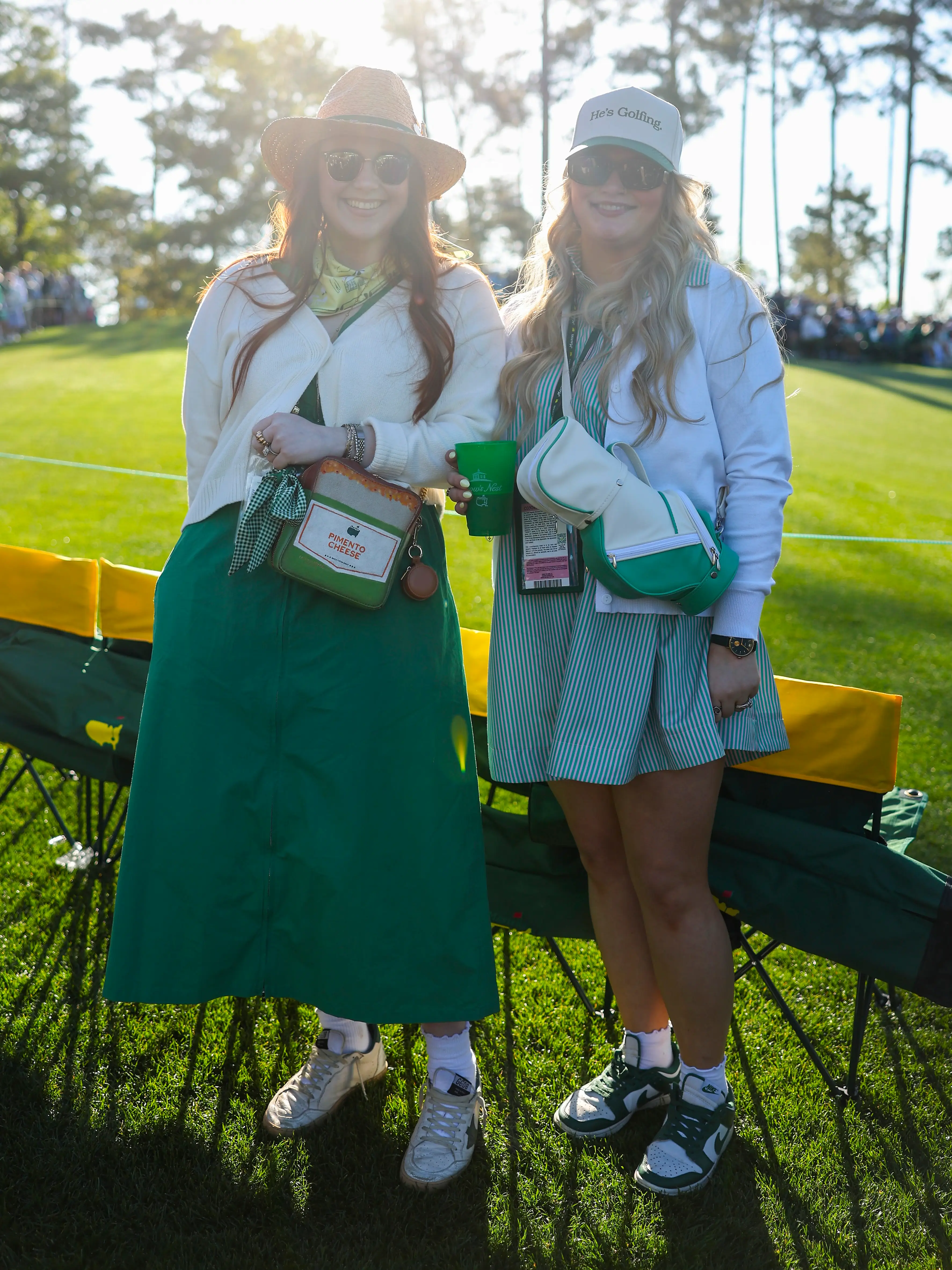 Two people attend the 2026 Masters Tournament in Augusta, Georgia.