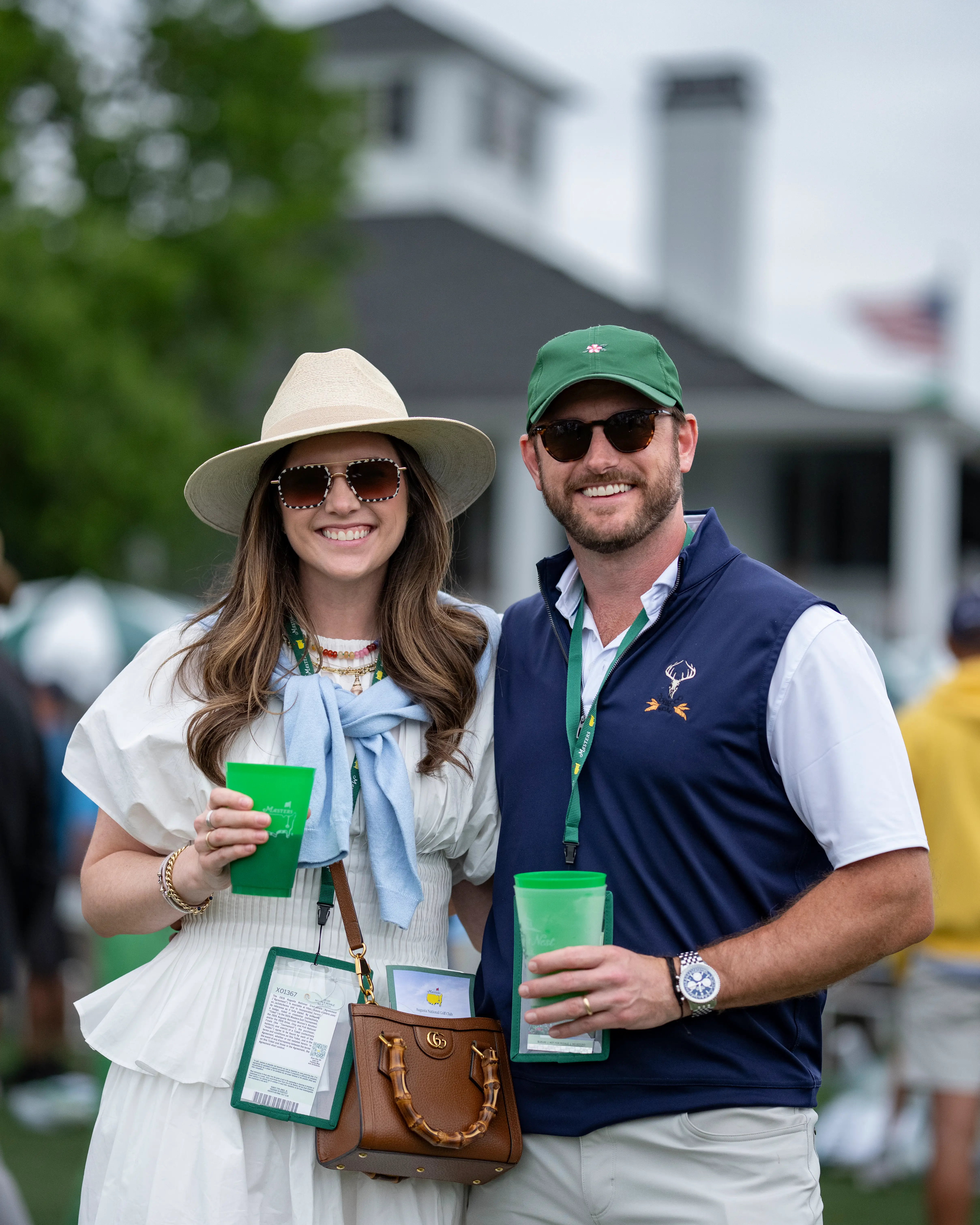 A woman and a man attend the 2026 Masters Tournament in Augusta, Georgia.