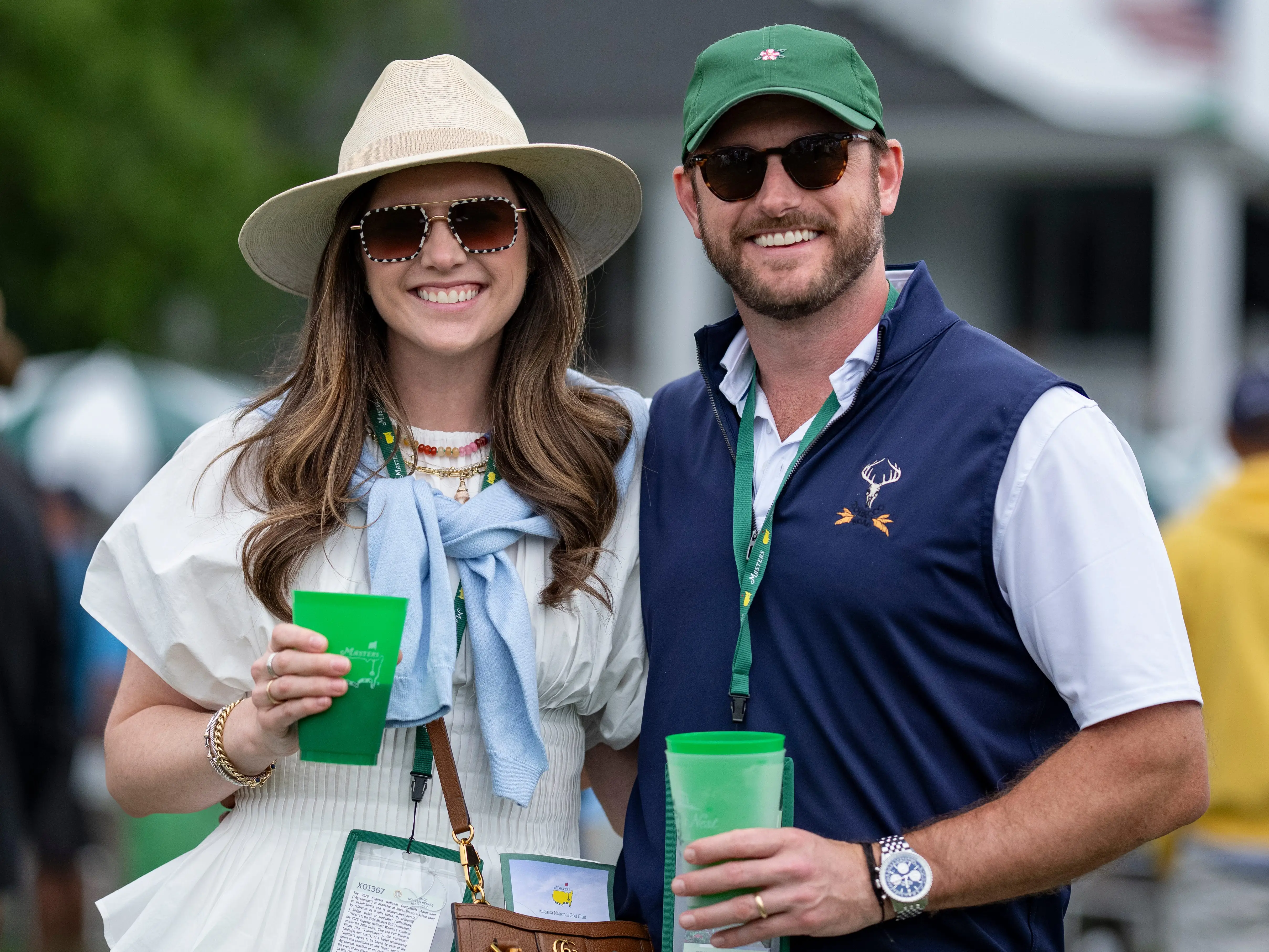 A woman and a man attend the 2026 Masters Tournament in Augusta, Georgia.