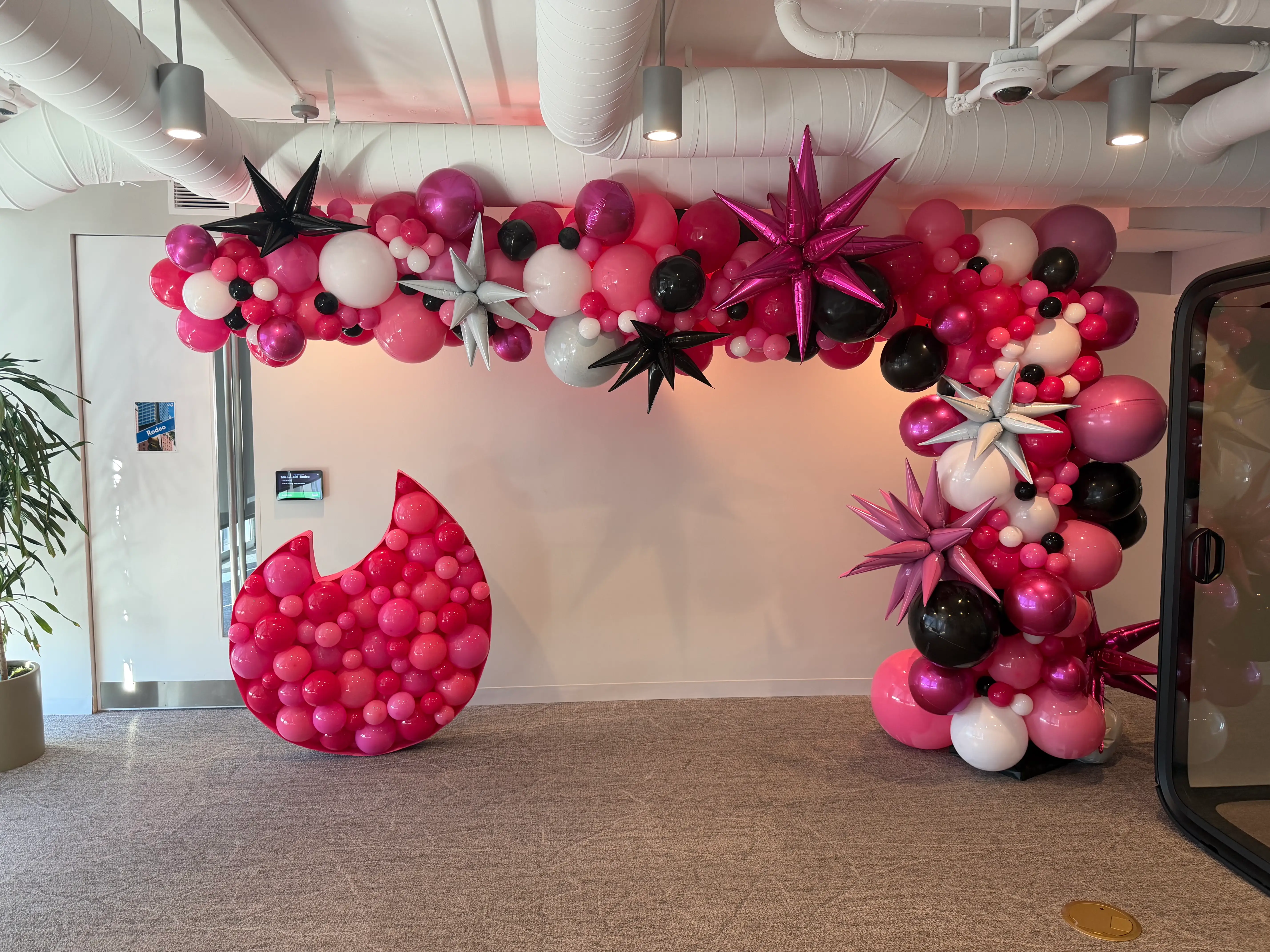 A balloon structure from the Tinder Sparks event is pictured.