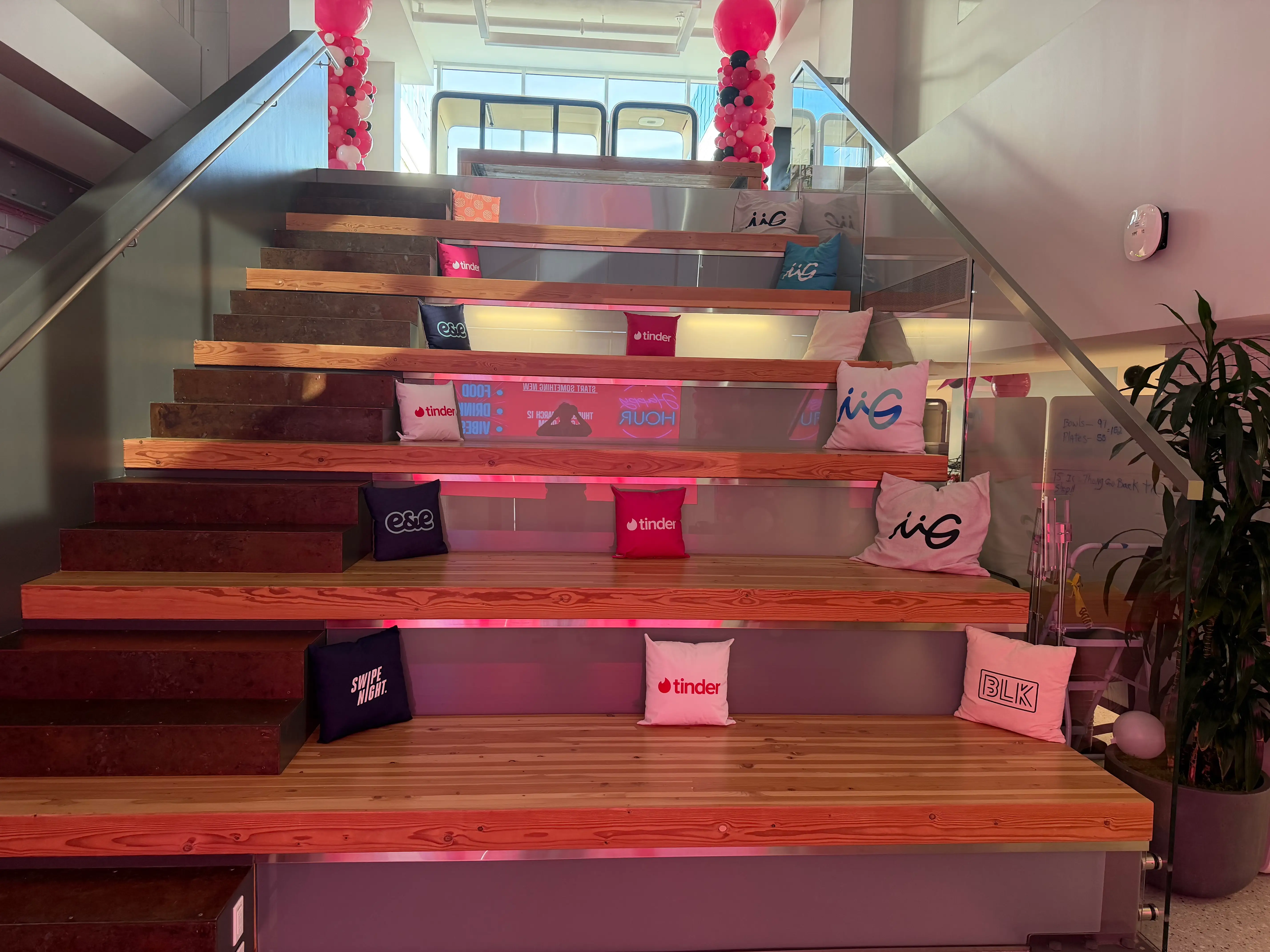 A set of Tinder and Match Group pillows are set up at Tinder's headquarters.