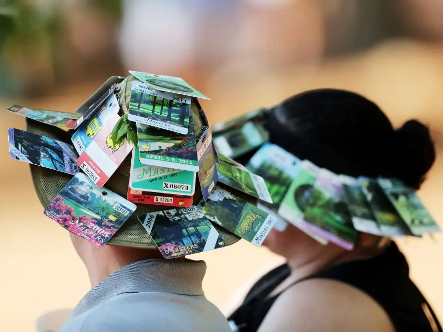 Masters patrons with badges on their hats