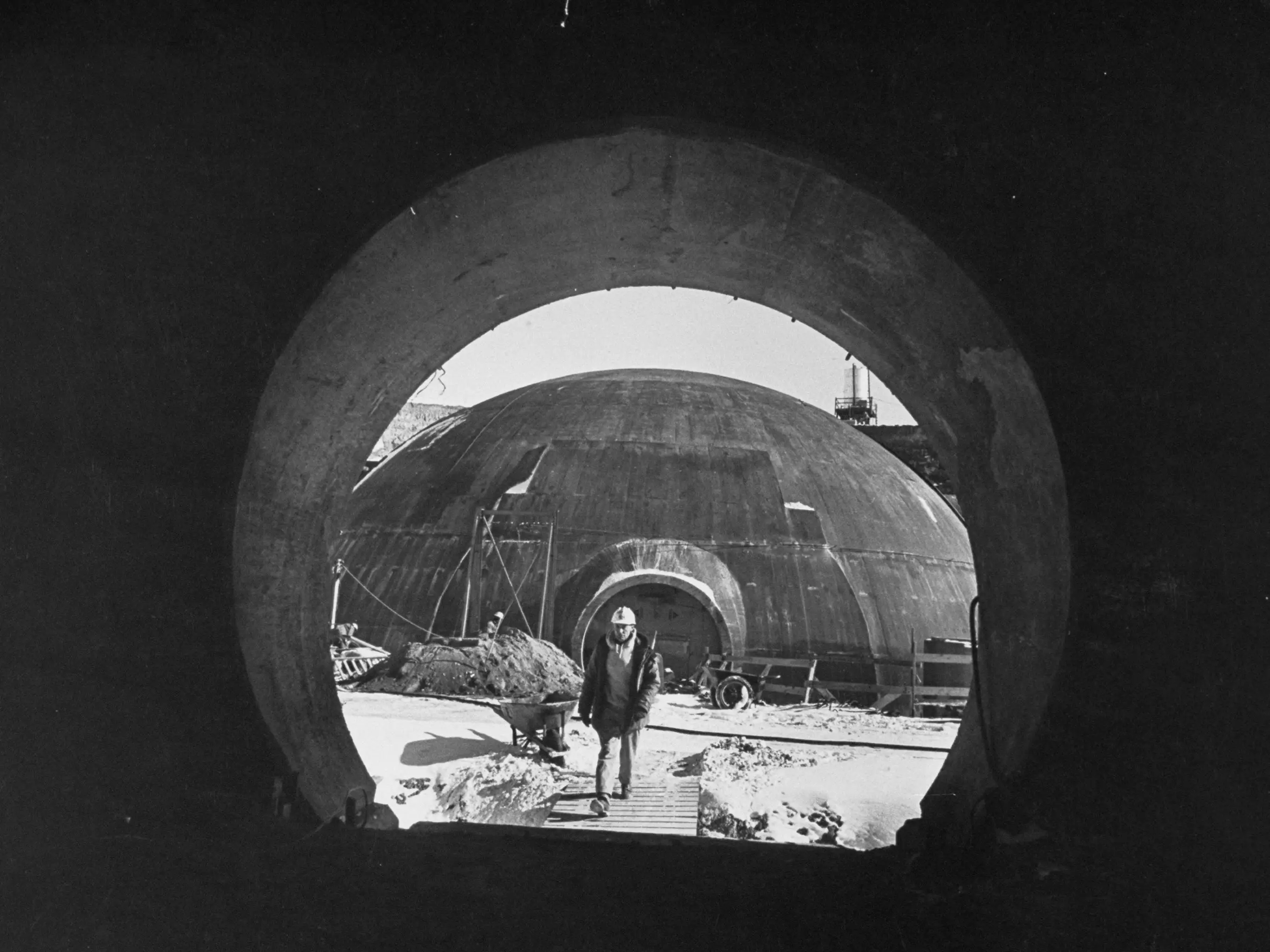 A person walking into a Titan I facility.