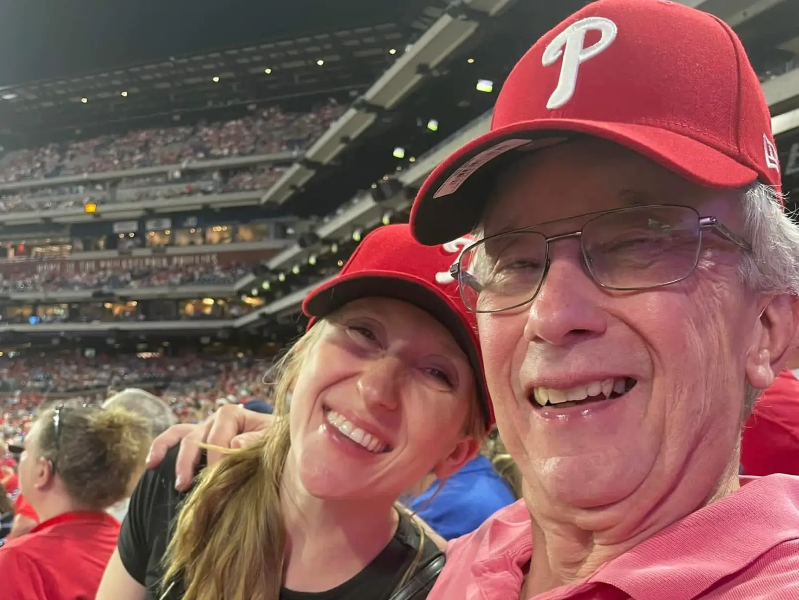 A selfie of the writer and her dad at a game in Philly.