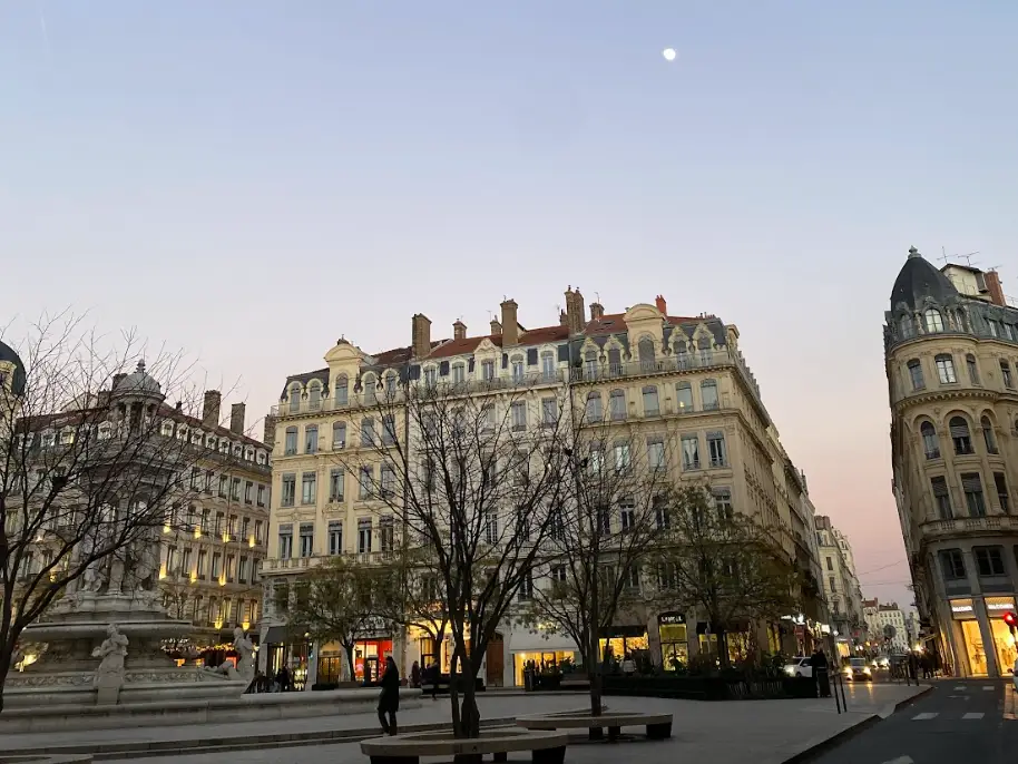 A street after dusk in Lyon, France.
