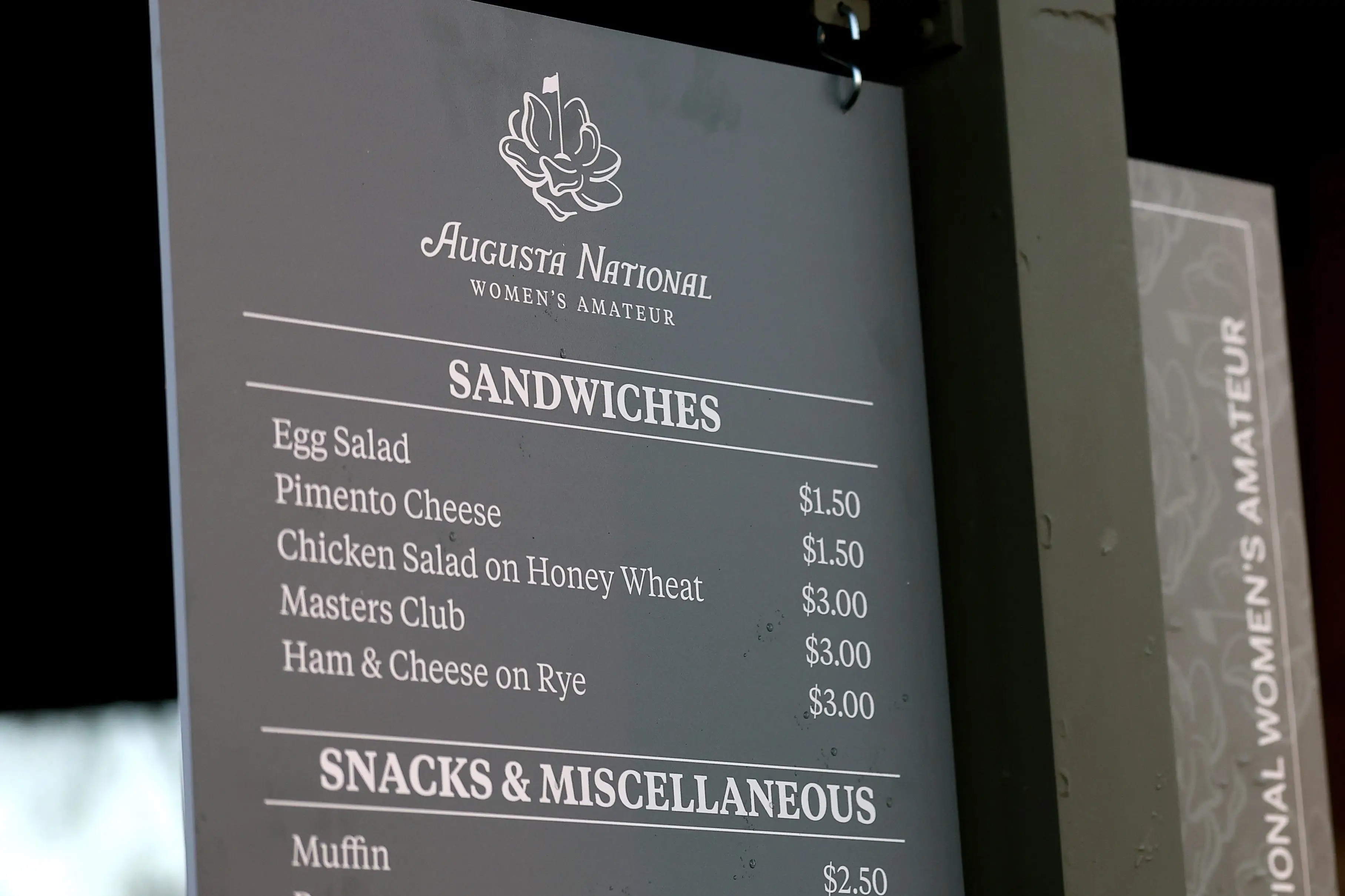 The Augusta National food menu sign.