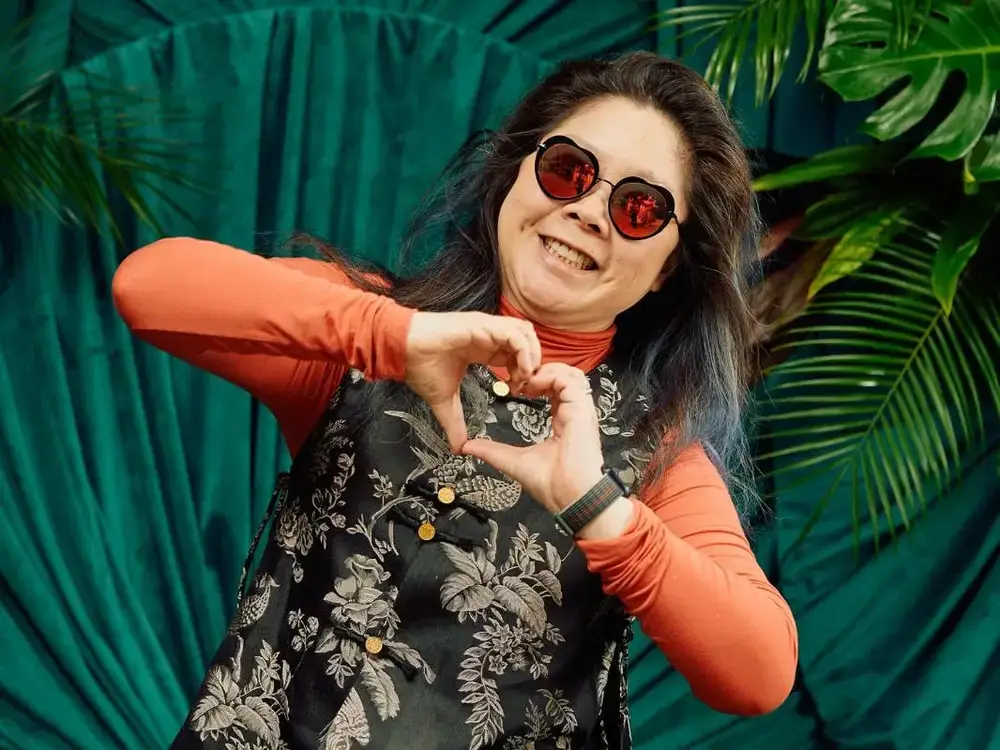 woman in heart sunglasses