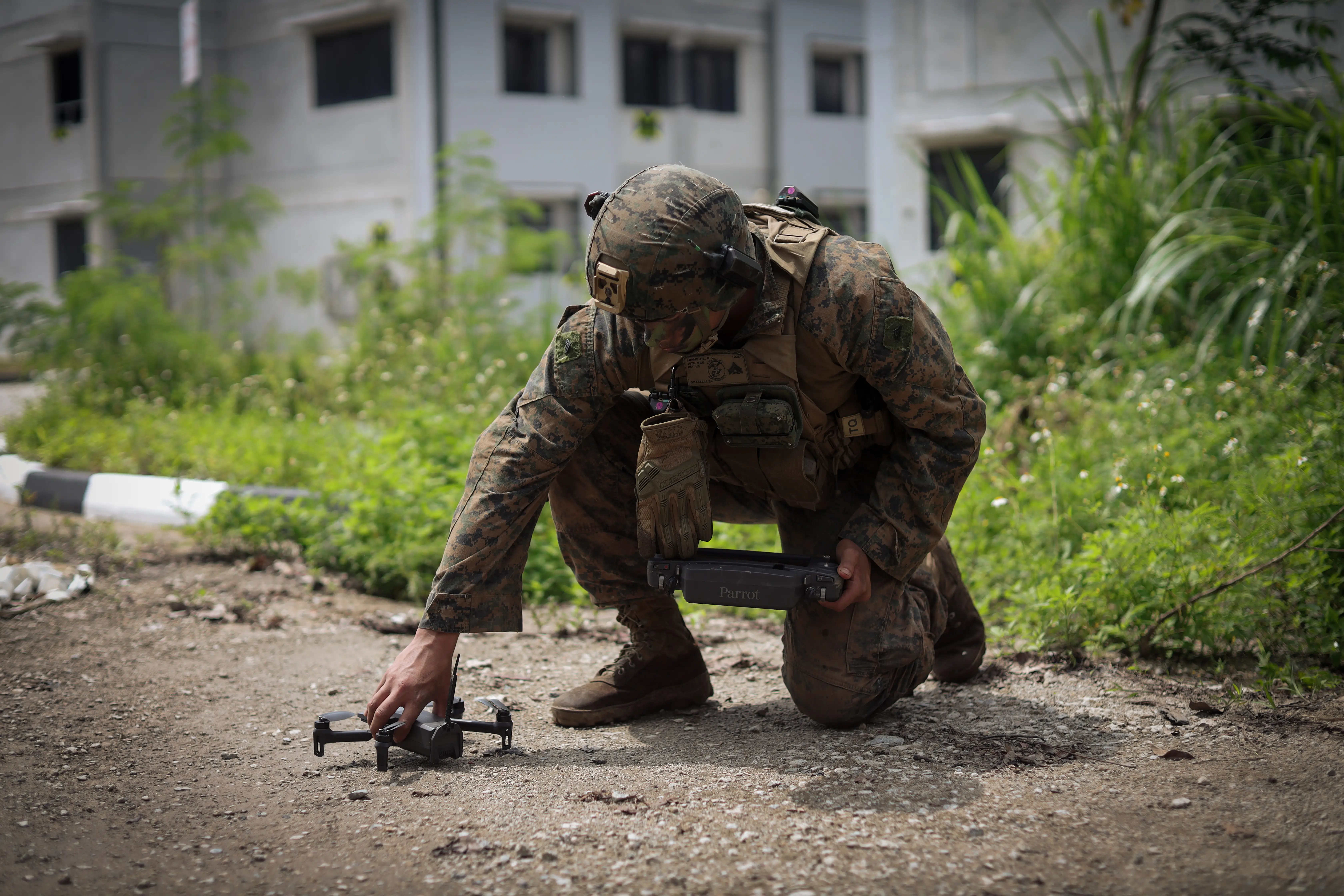 A Marine with 1st Marine Division handles a Parrot Amari AI drone during a training exercise in Singapore, March 26, 2025.
