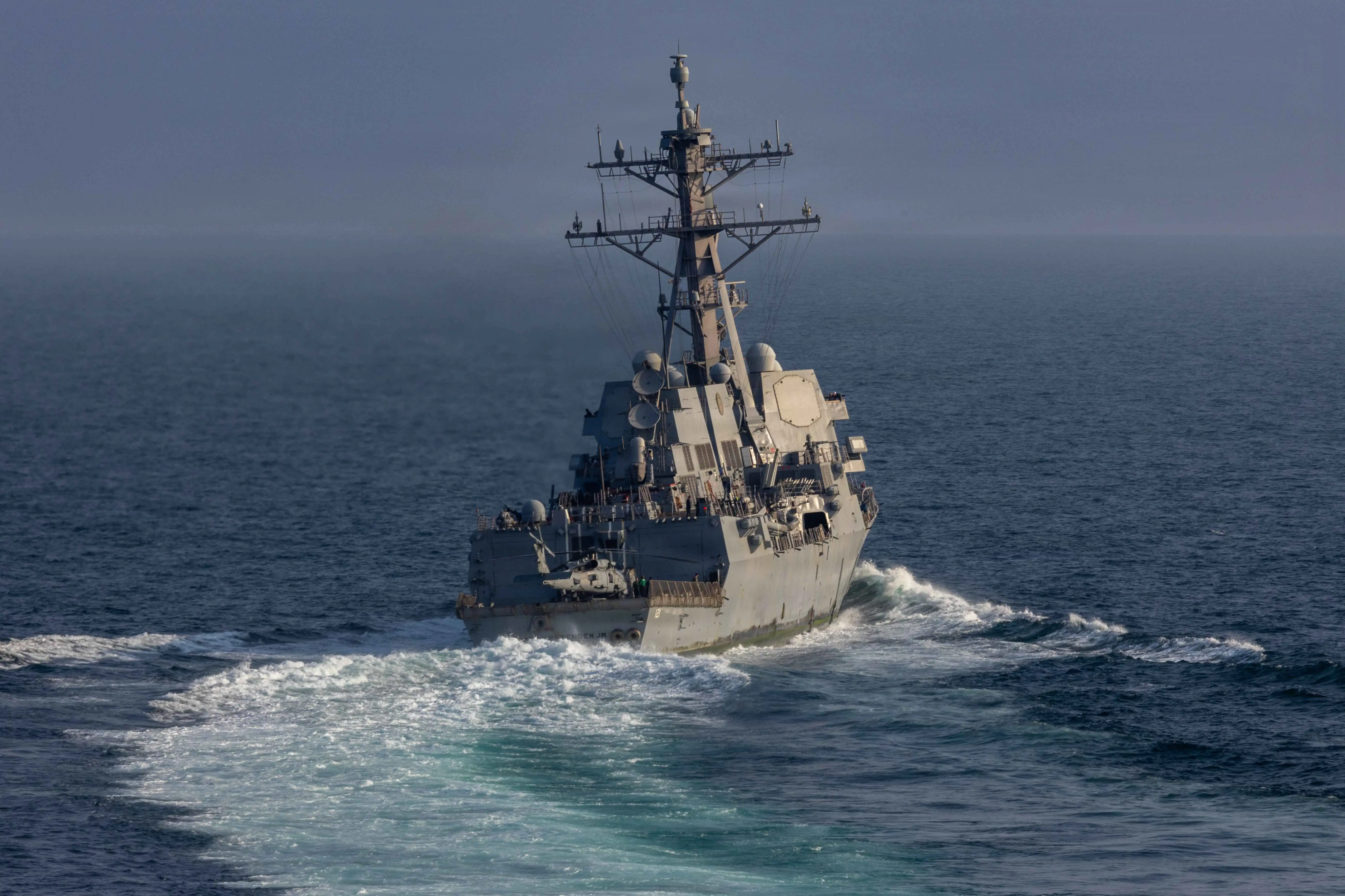 Arleigh Burke-class guided-missile destroyer USS Frank E. Petersen Jr. (DDG 121) sails in the Arabian Sea during Operation Epic Fury, March 18, 2026.