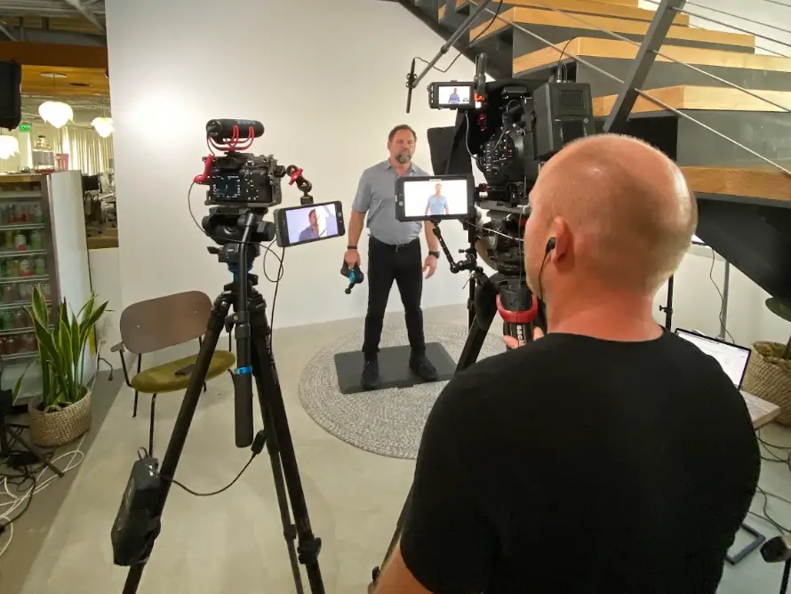 Dr. Jason Wersland recording a video at the Therabody office.