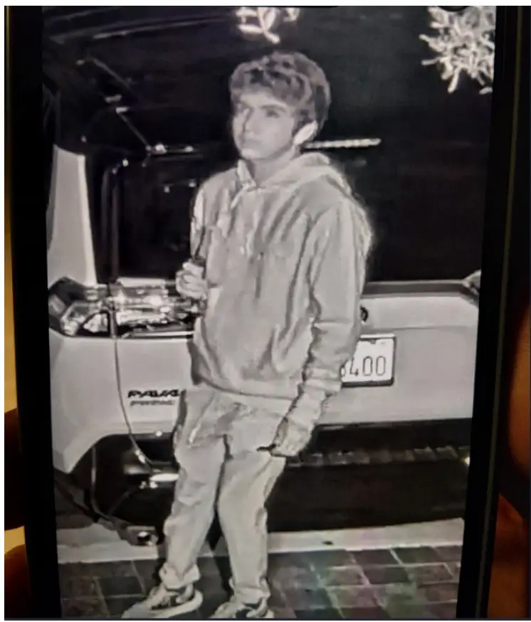 A black and white image of a the man who alleged attacked Sam Altman's home