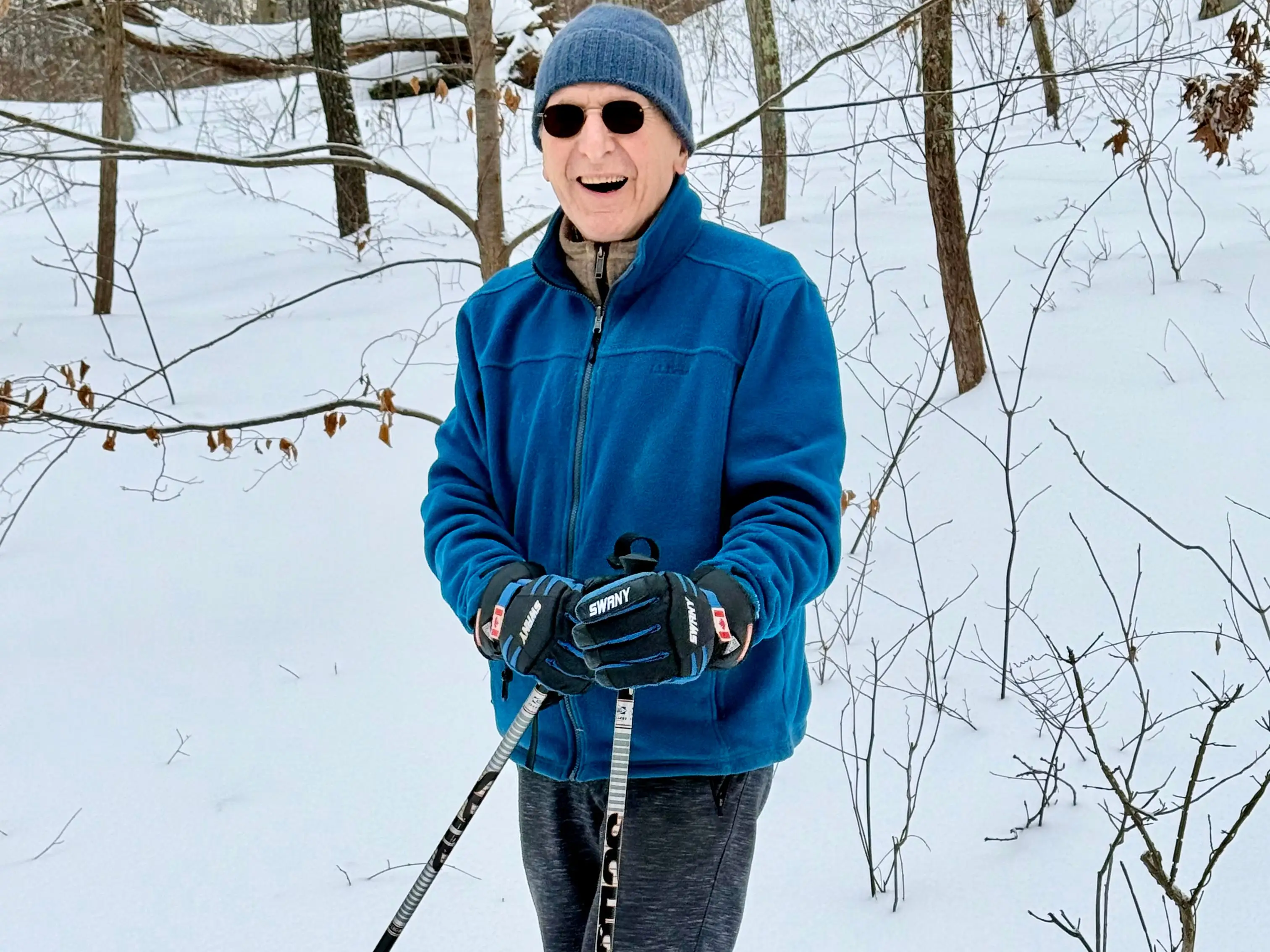 A senior showshoeing