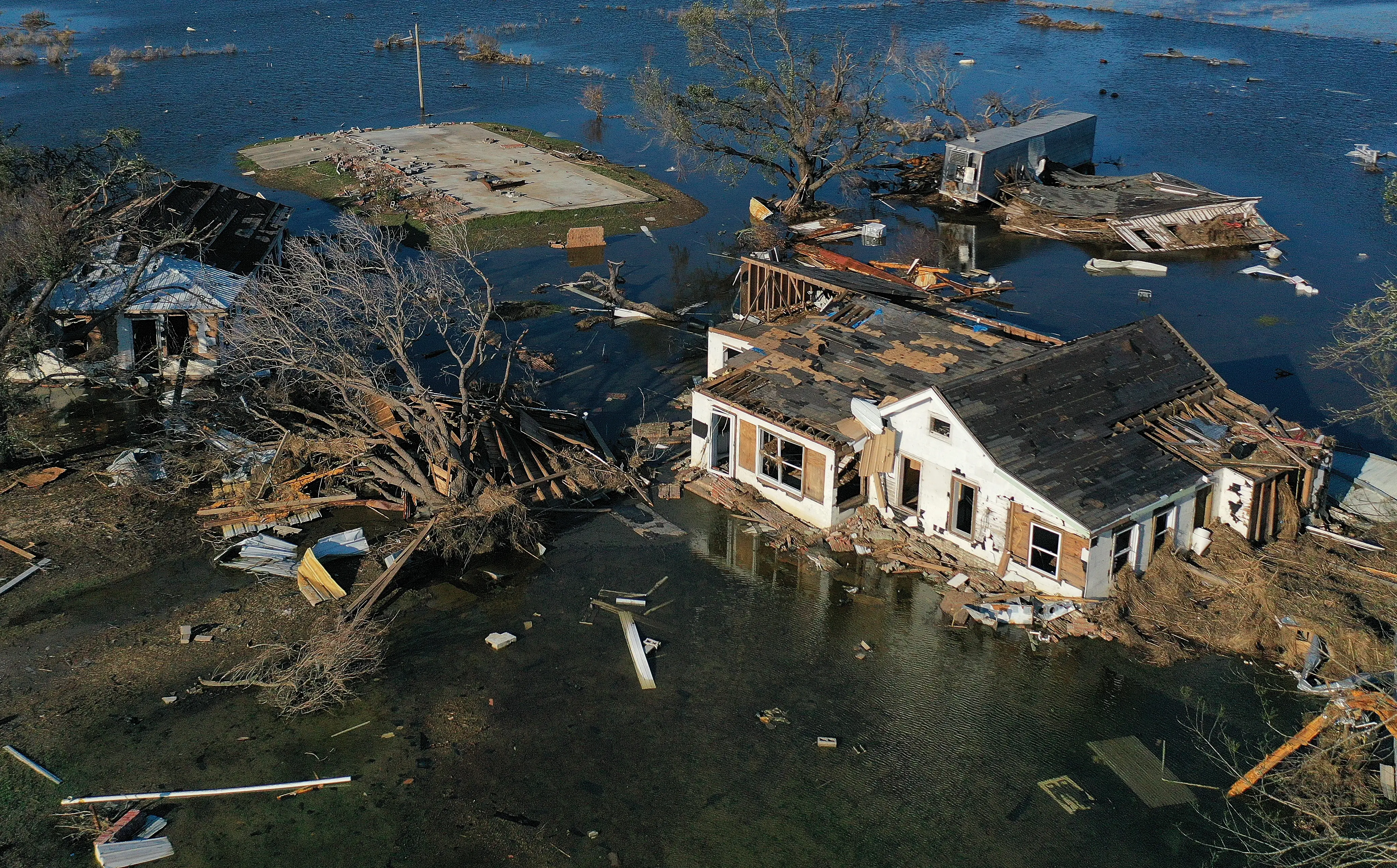 An aerial view of flood waters from Hurricane Delta surrounding structures destroyed by Hurricane Laura on October 10, 2020 in Creole, Louisiana.