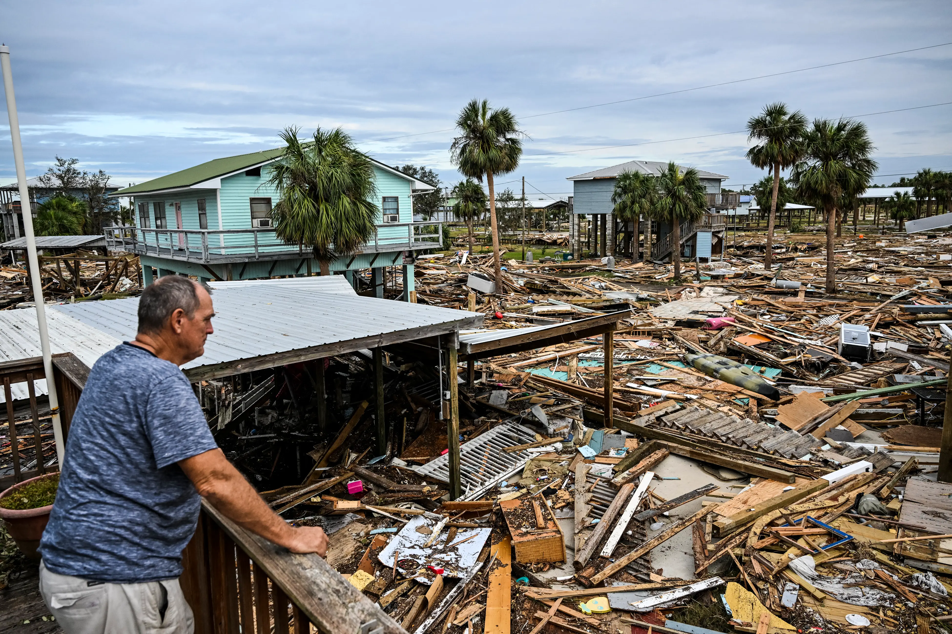 David Hester inspects damages of his house after Hurricane Helene made landfall in Horseshoe Beach, Florida, on September 28, 2024.