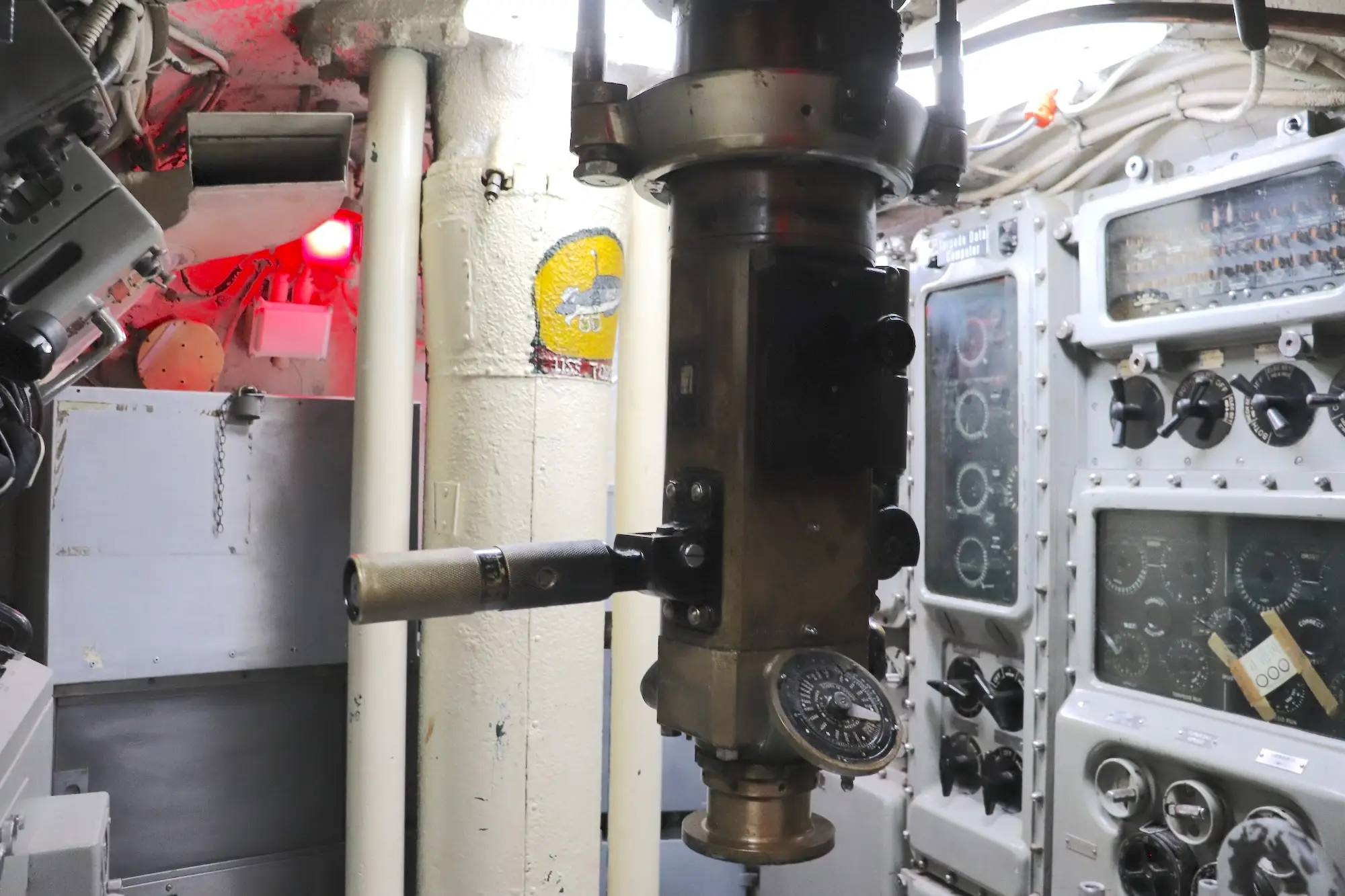 A periscope in the conning tower of the USS Torsk.