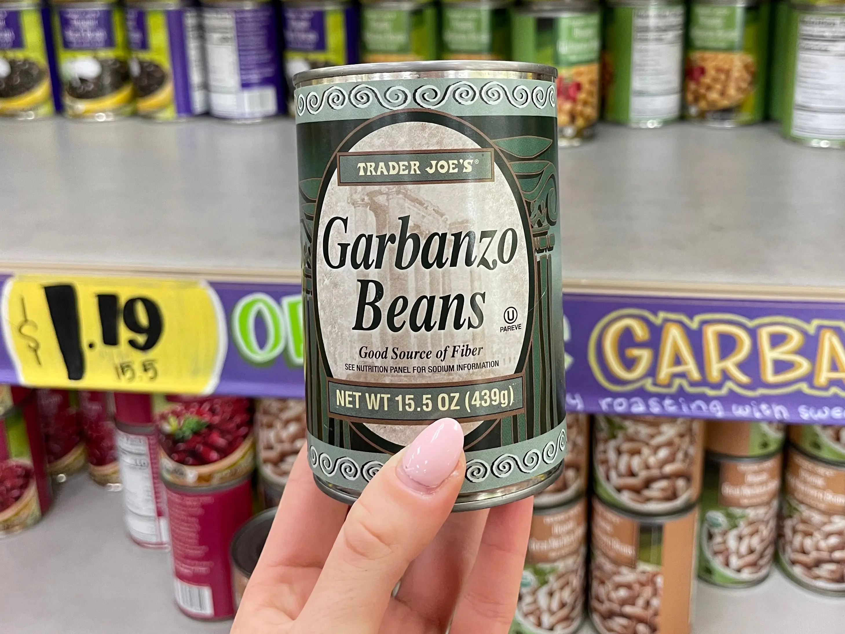 Serena holds a can of Trader Joe's garbanzo beans.