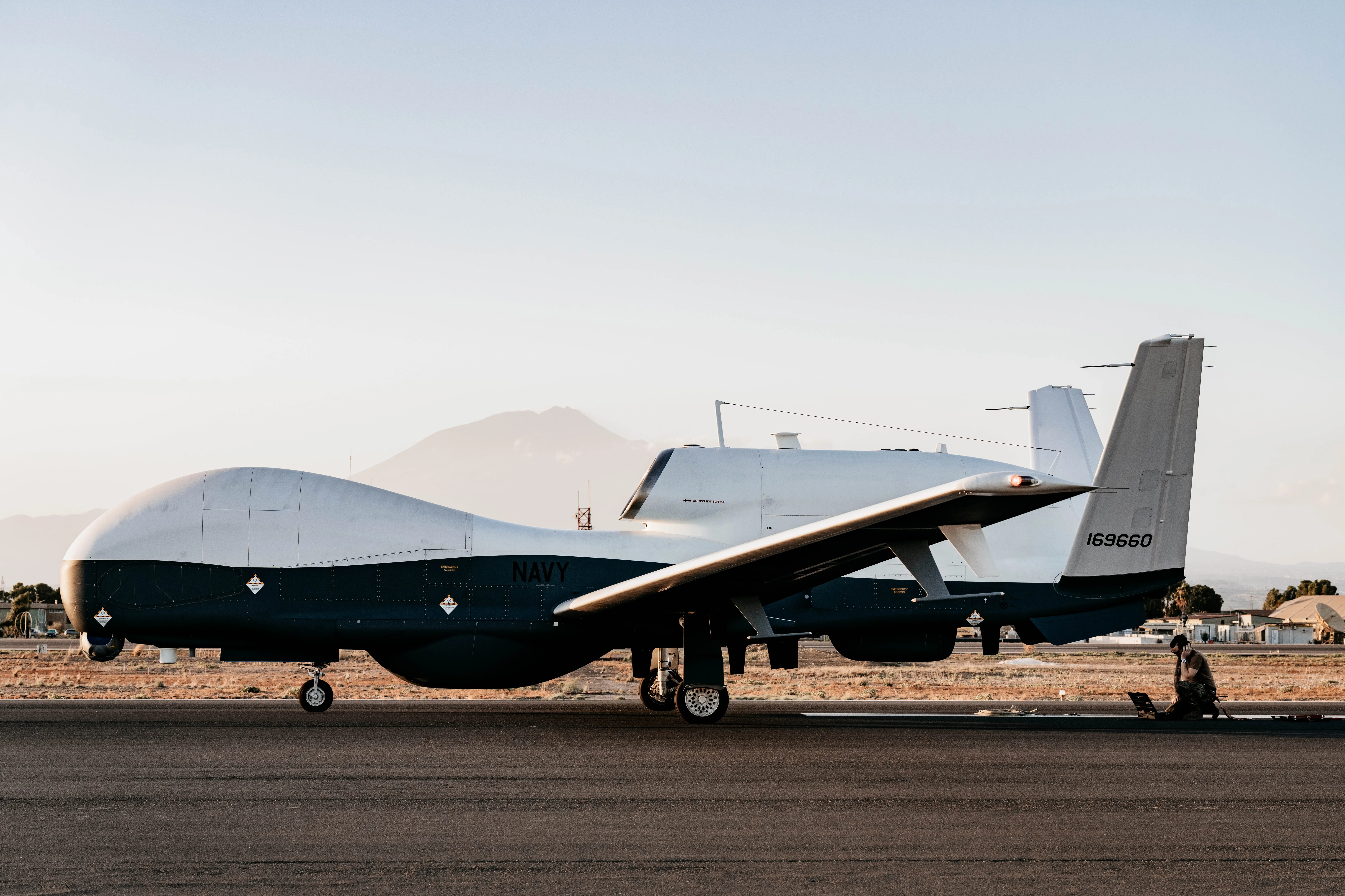 Aviation Electronics Technician Second Class Matt Belvery, assigned to Unmanned Patrol Squadron (VUP) 19, conducts post-flight checks on an MQ-4C Triton at Naval Air Station (NAS) Sigonella, Italy, Jul. 2, 2024.