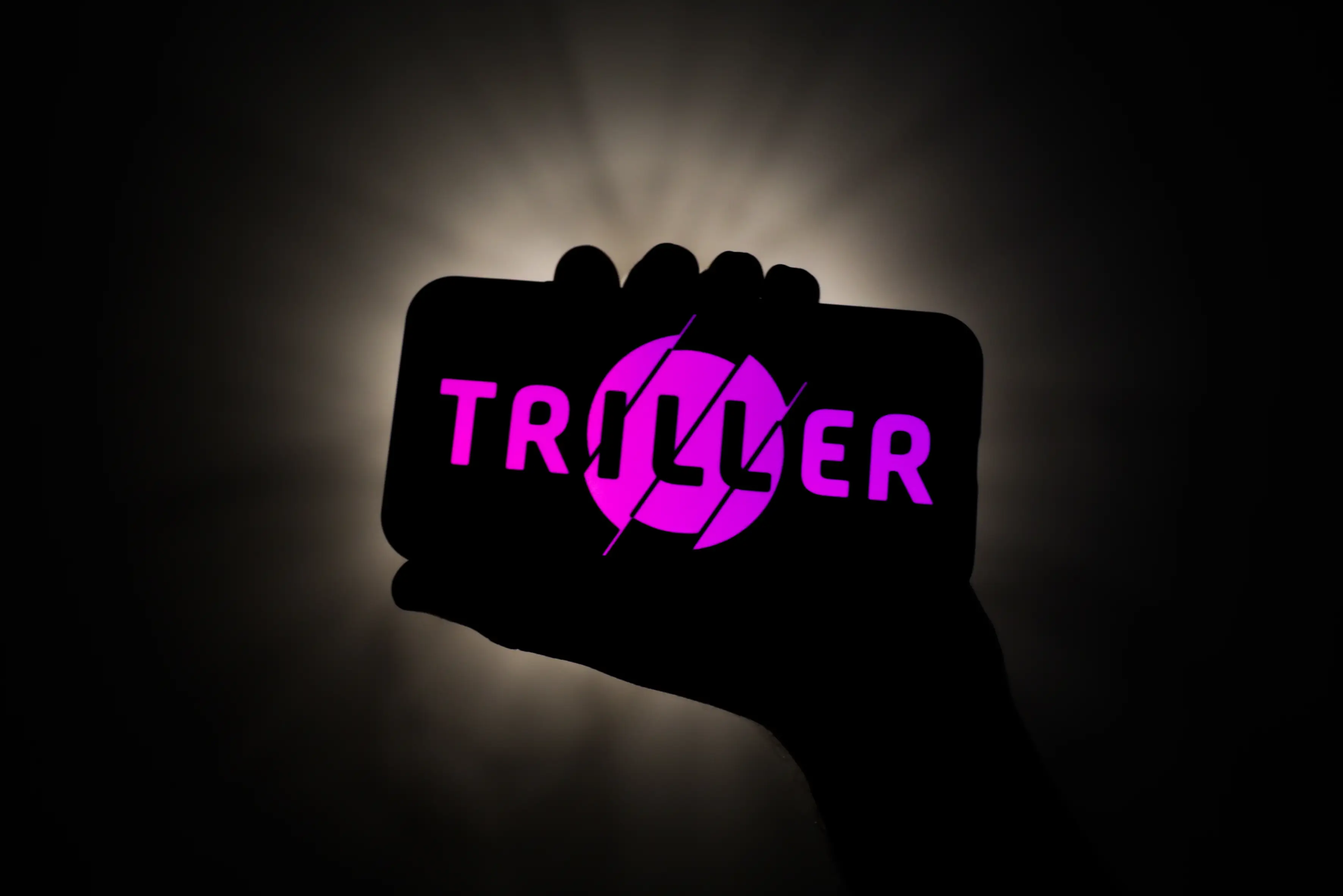 Triller logo.