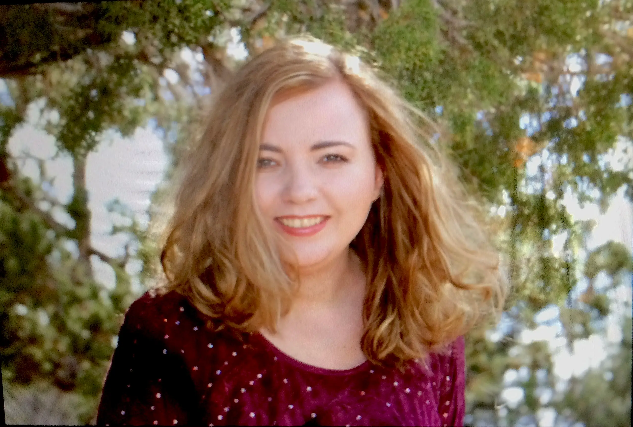 Briell Decker in a purple shirt