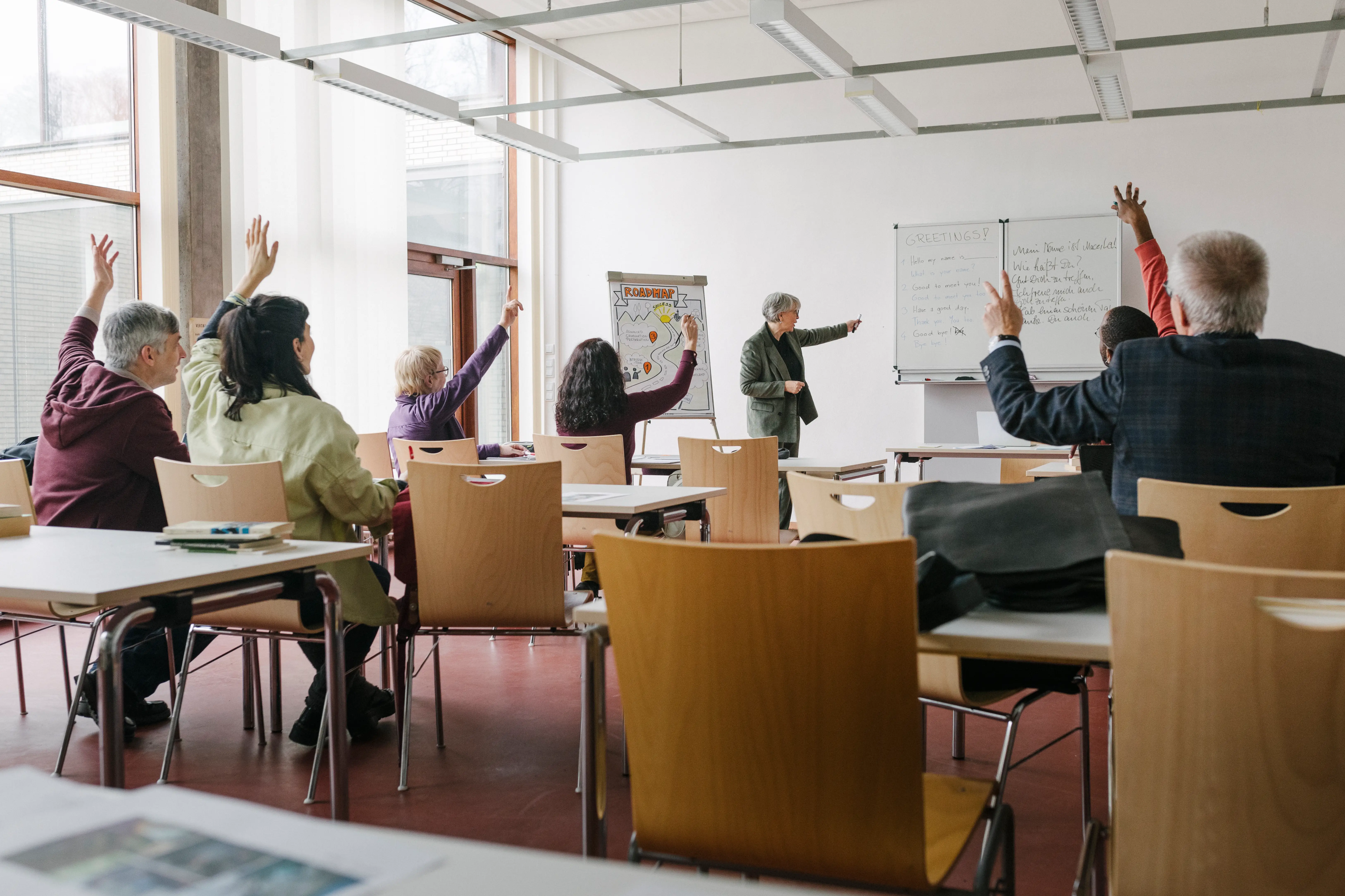 raised hands in classroom