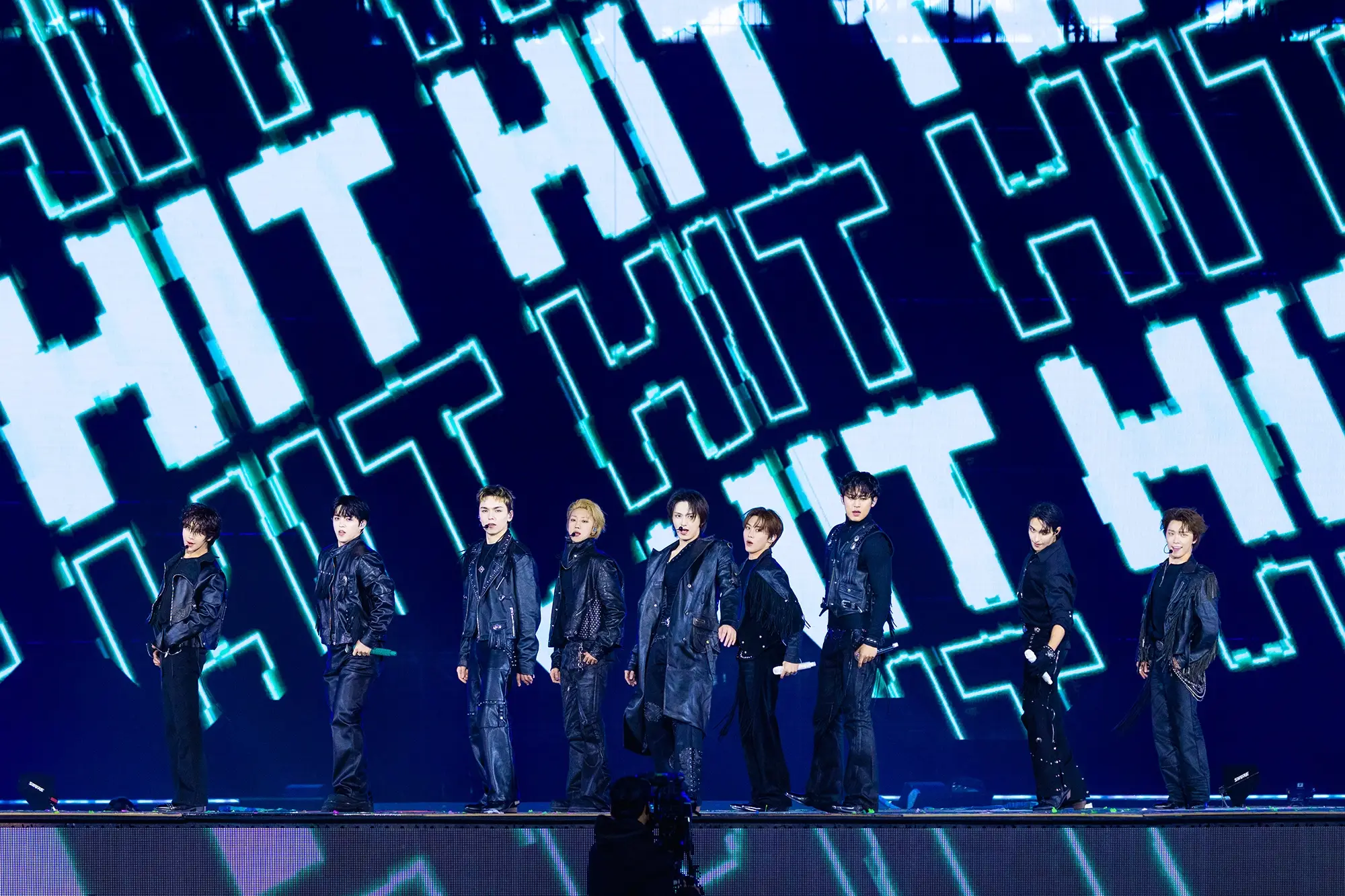 A group shot of Seventeen on stage in Seoul.