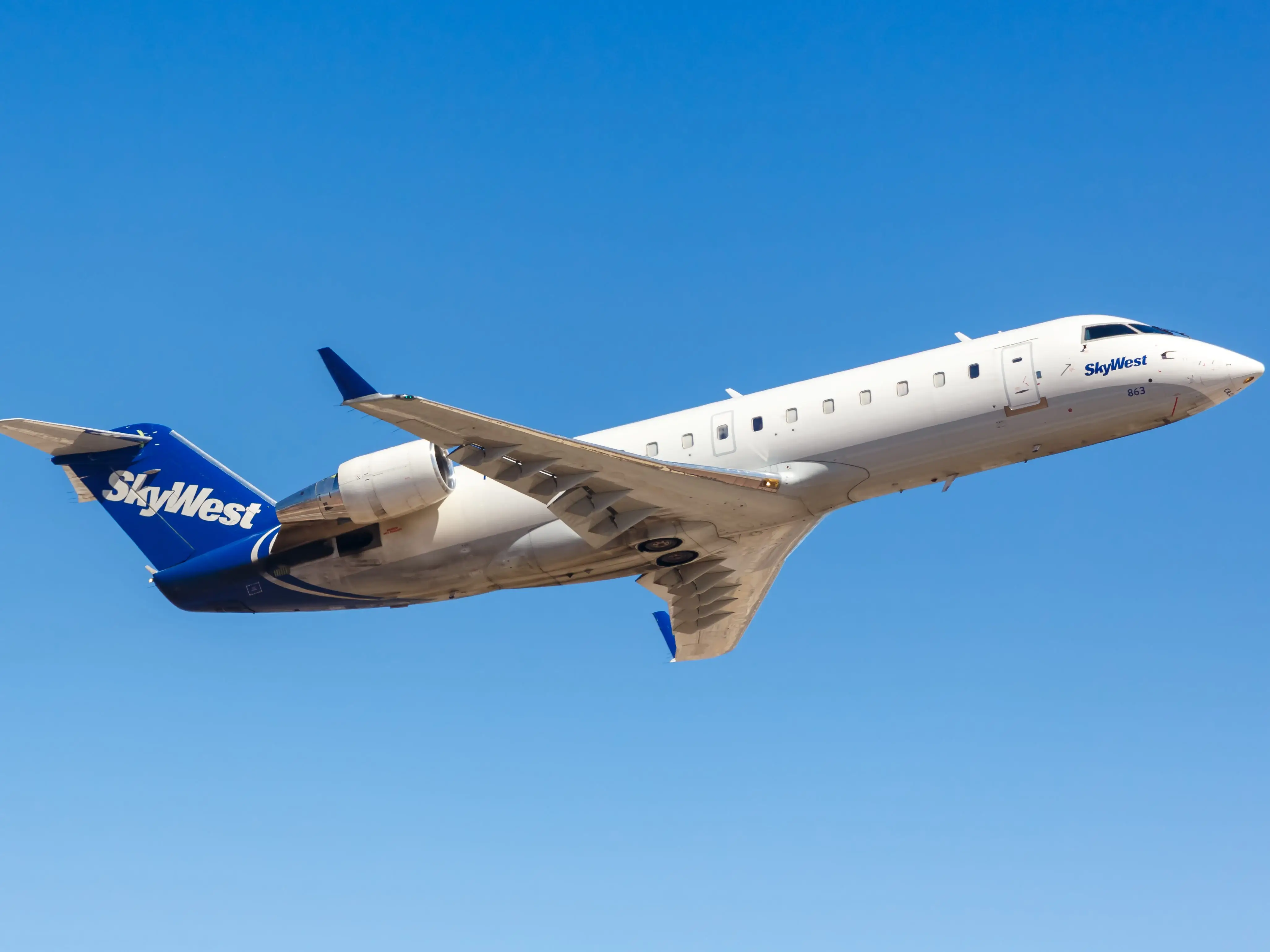SkyWest Bombardier CRJ-200 airplane at Phoenix Sky Harbor airport (PHX) in Arizona.