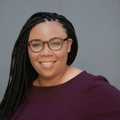 A headshot of Ashleigh Coaxum.