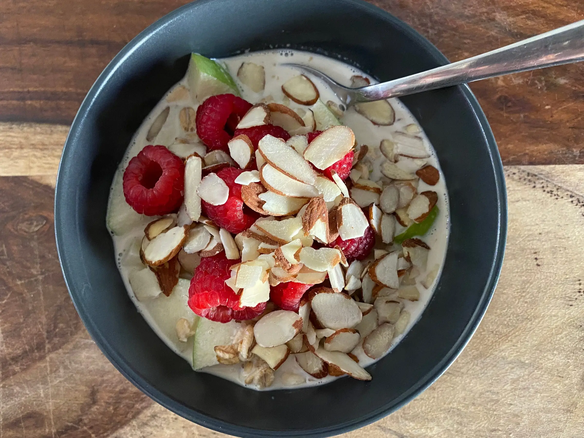 oatmeal with raspberries, almonds, apple