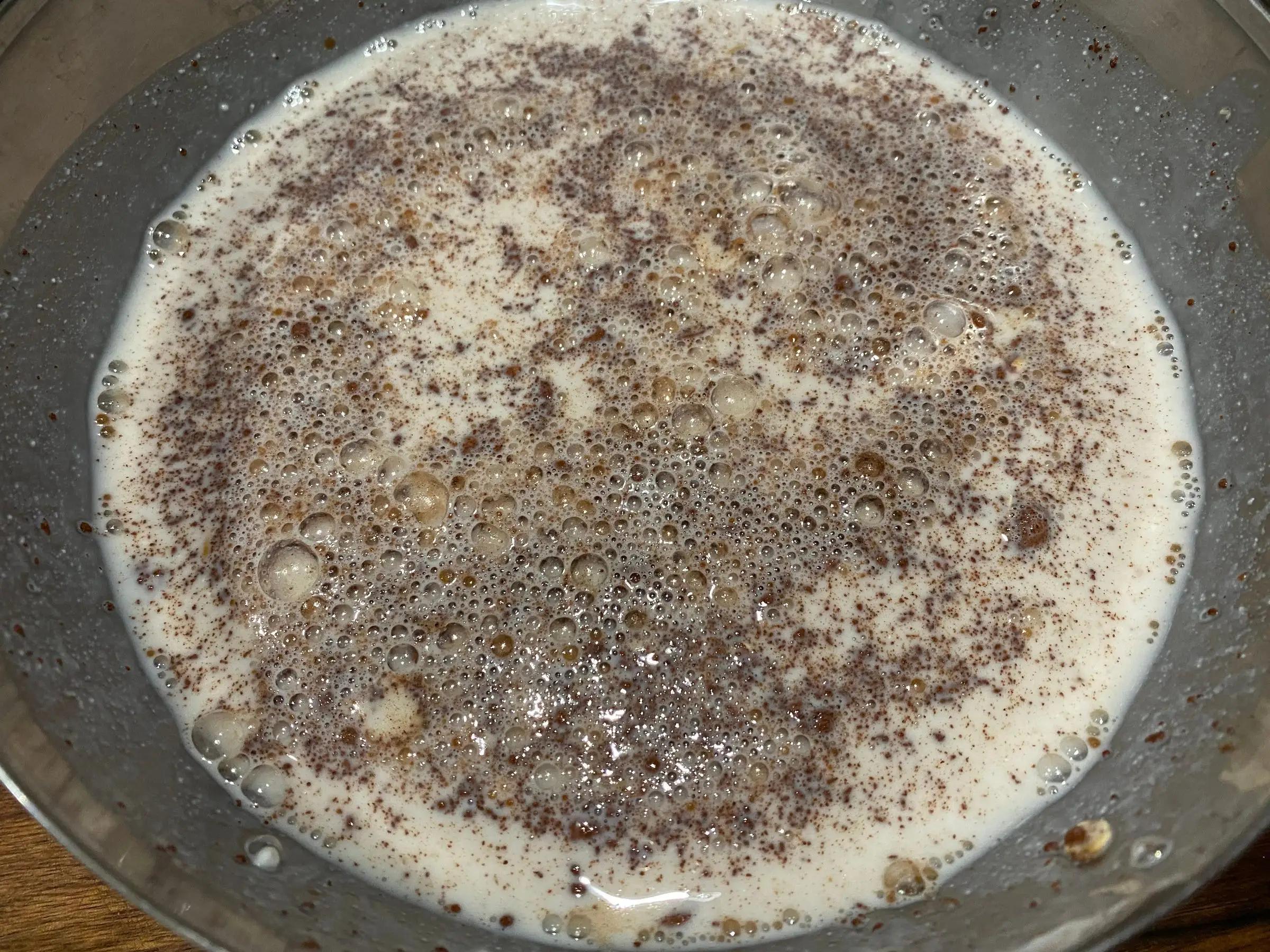 oats, milk, cinnamon in bowl