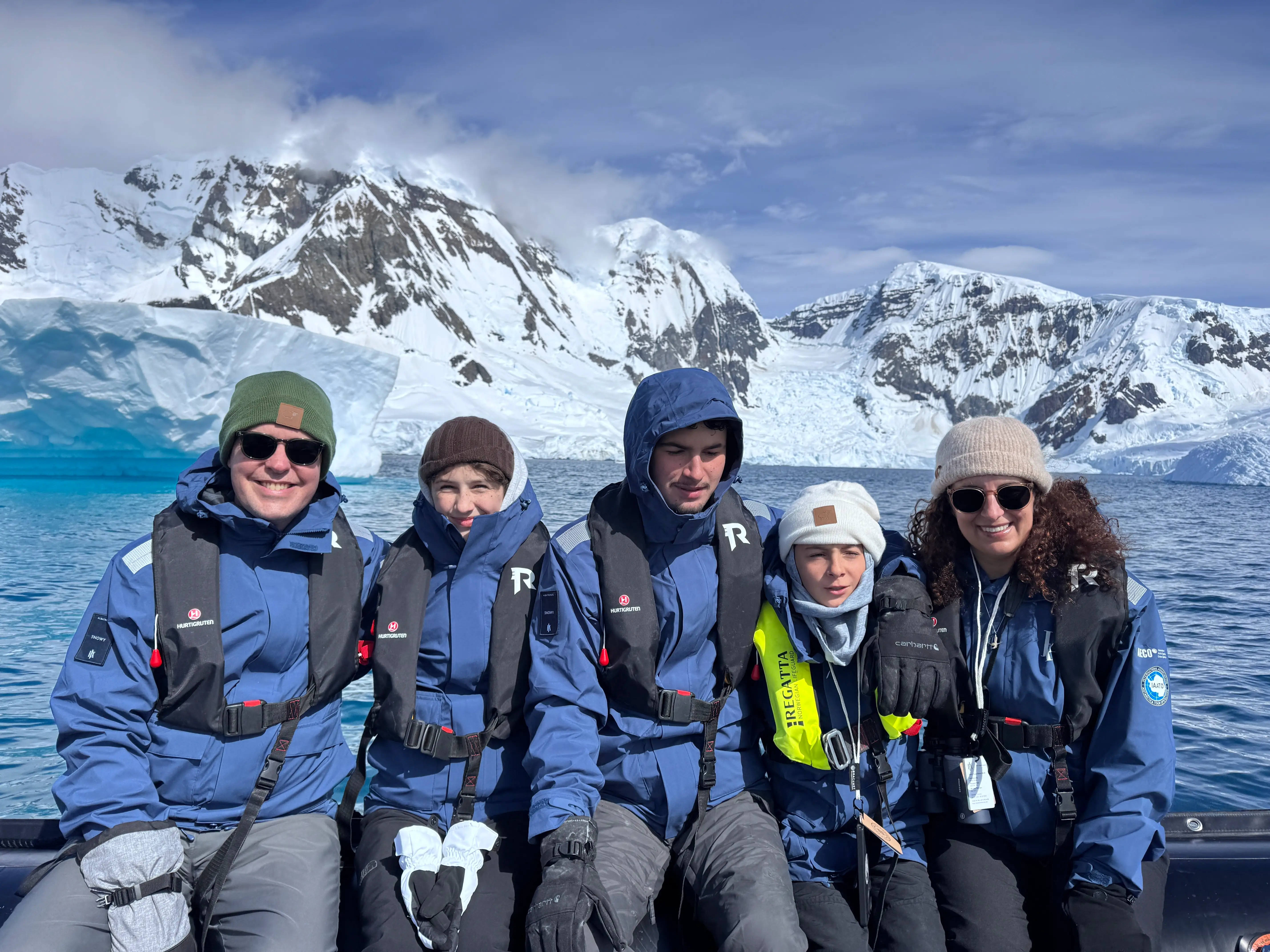 The author and her family pose while on a trip to Antarctica.