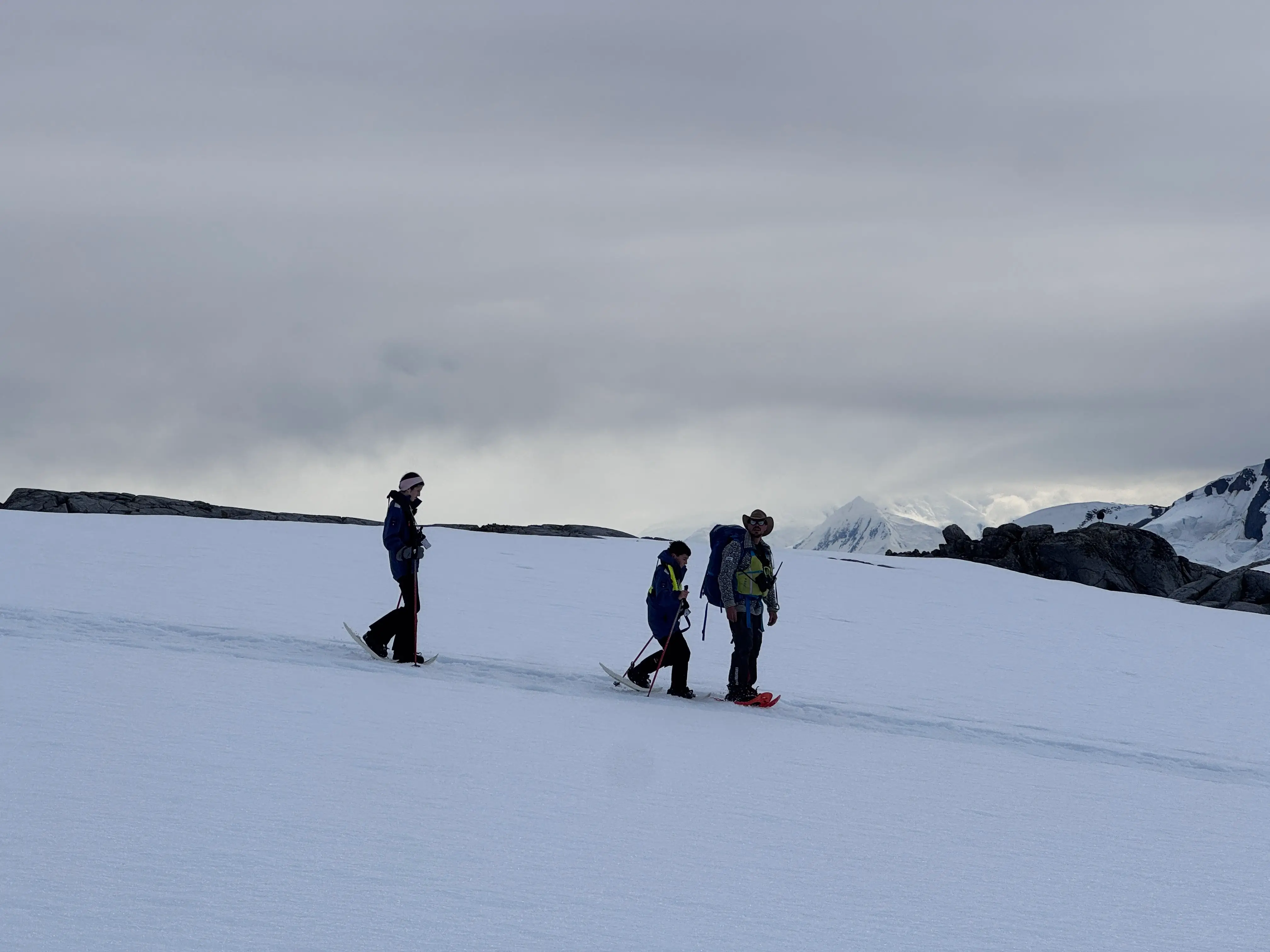 The author's family snowshoes in Antarctica.