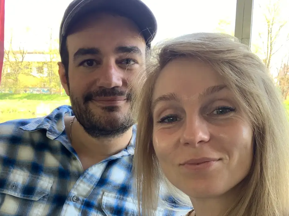 The writer and her husband posing for a selfie.