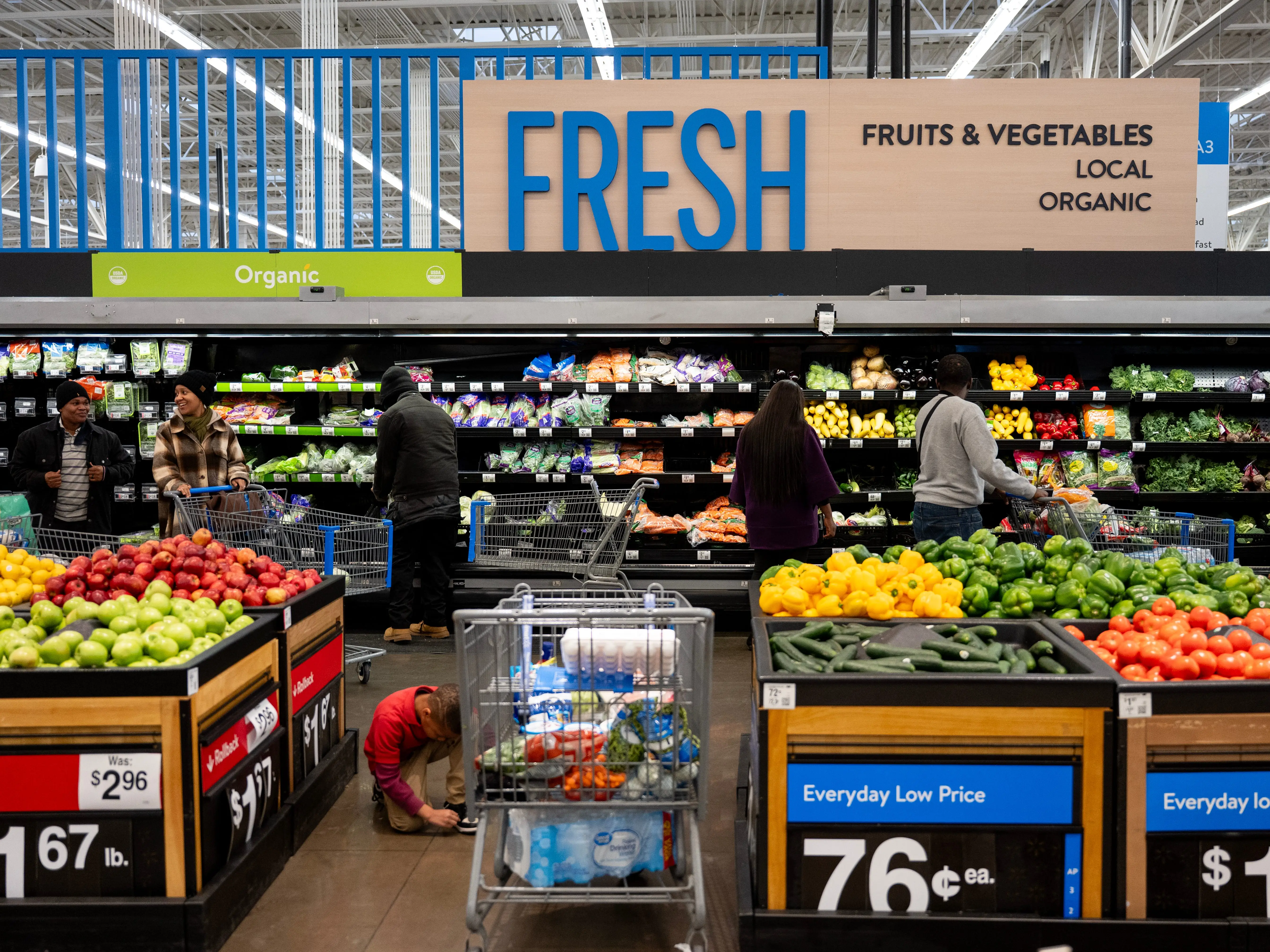 Customers shop at Walmart on January 22, 2026 in Little Rock, Arkansas.