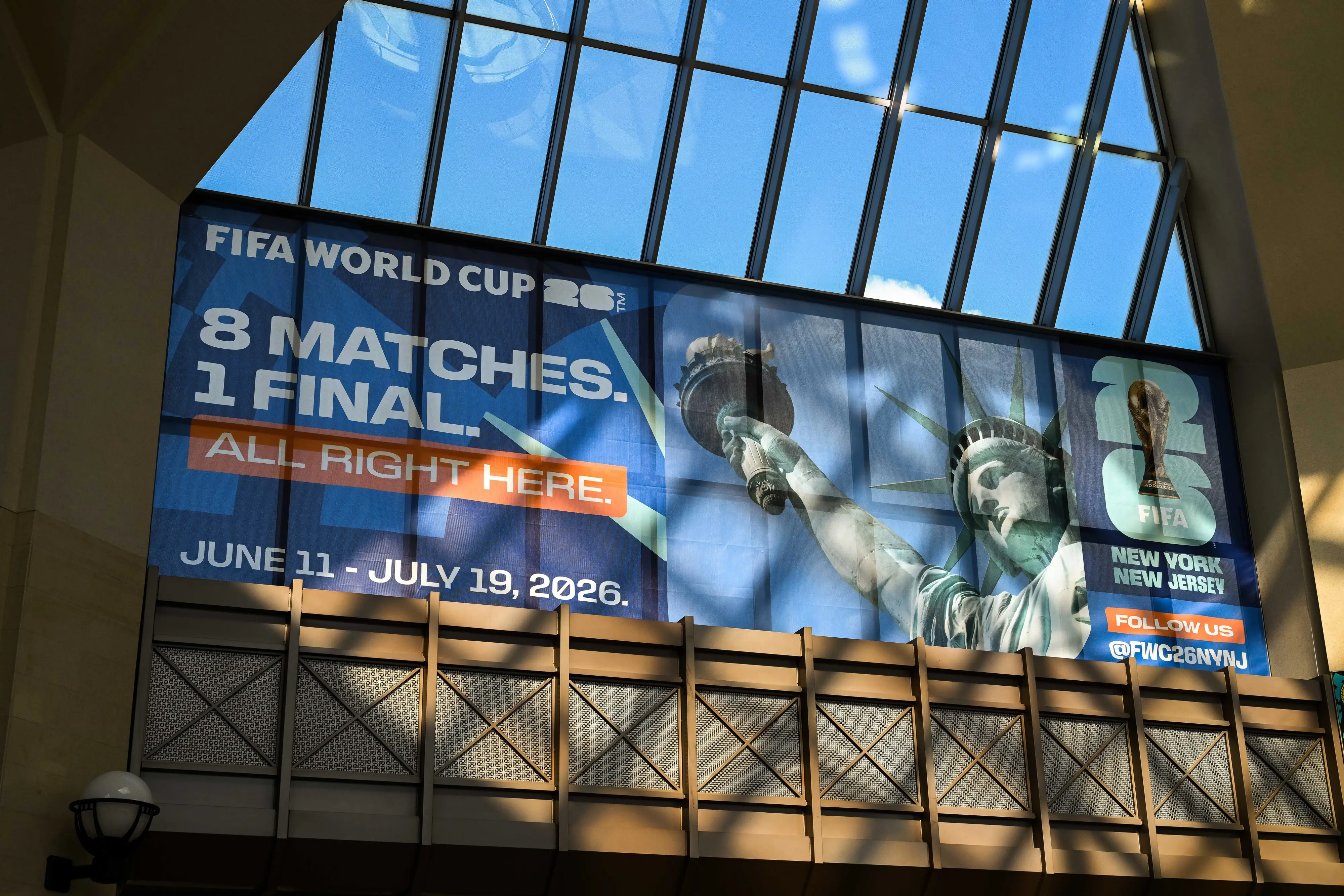 A banner for the Fifa World Cup at Secaucus Junction station in Secaucus, New Jersey, US, on Friday, April 17, 2026. New Jersey Transit plans to announce a special FIFA ticket on Friday that could cost more than $100 for riders going to MetLife Stadium for World Cup games. Photographer: Adam Gray/Bloomberg via Getty Images