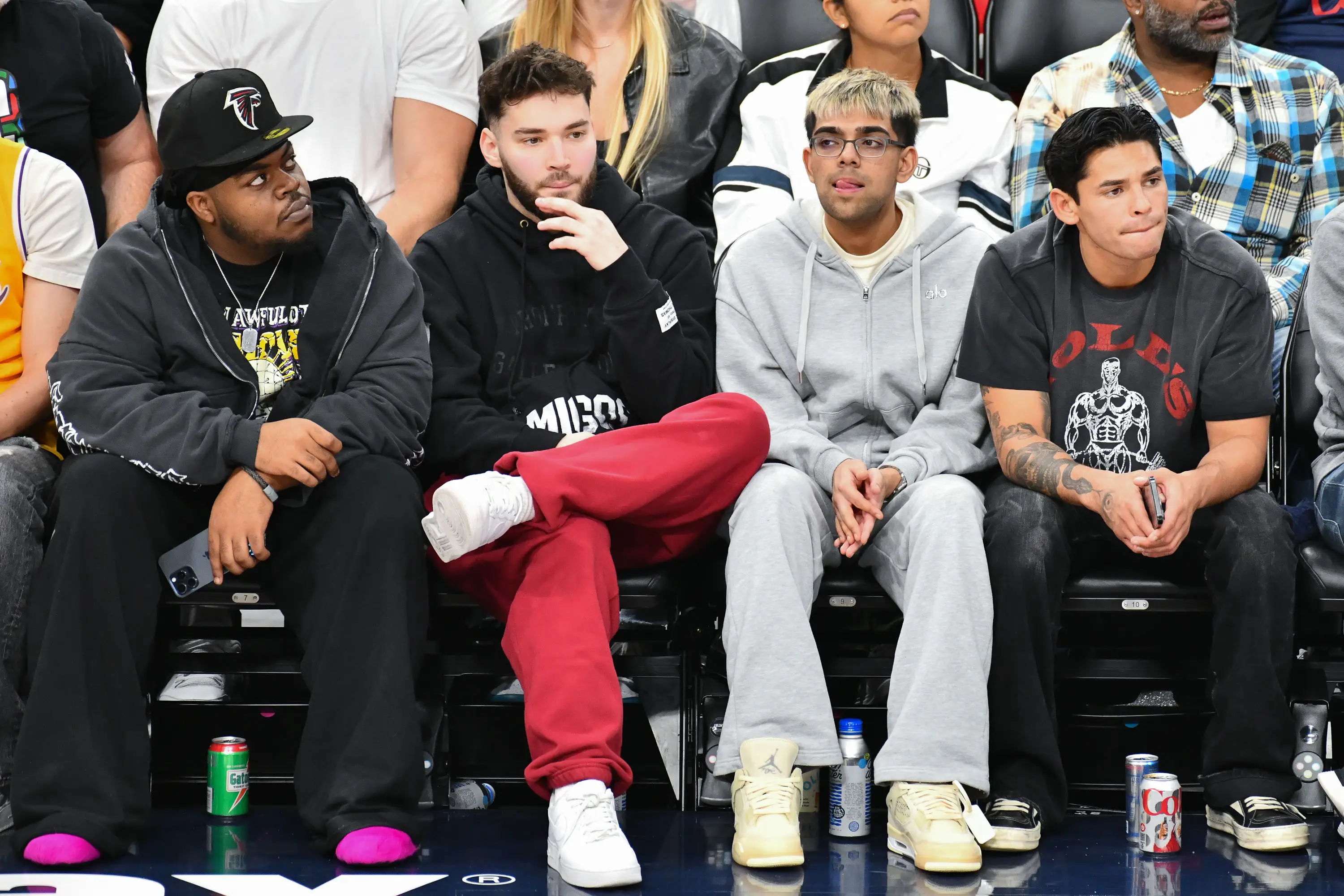 INGLEWOOD, CALIFORNIA - DECEMBER 20: (L-R) Shnaggy Hose, Adin Ross, N3on and Ryan Garcia attend a basketball game between the Los Angeles Clippers and the Los Angeles Lakers at Intuit Dome on December 20, 2025 in Inglewood, California. NOTE TO USER: User expressly acknowledges and agrees that, by downloading and/or using this Photograph, user is consenting to the terms and conditions of the Getty Images License Agreement. (Photo by Allen Berezovsky/Getty Images)