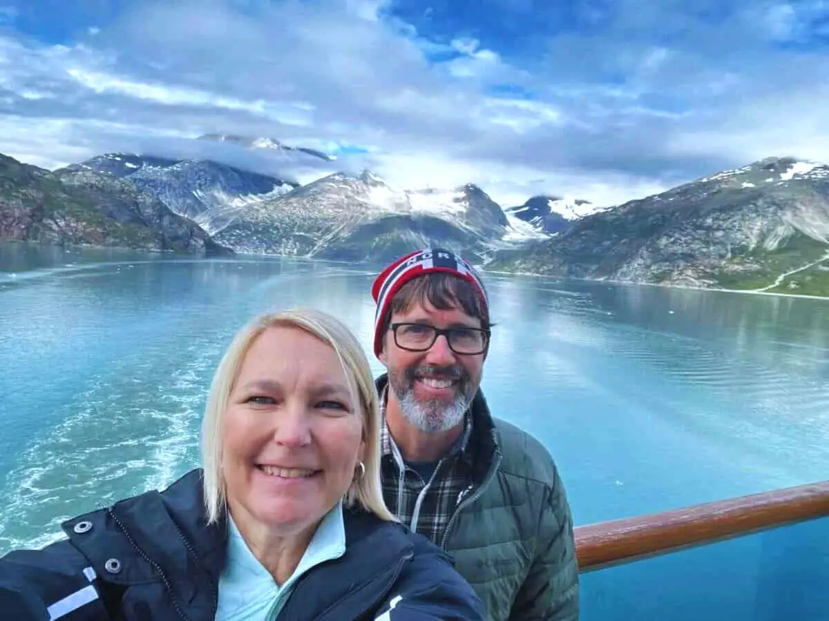 Scott and his wife take a selfie from a boat in Glacier Bay National Park.
