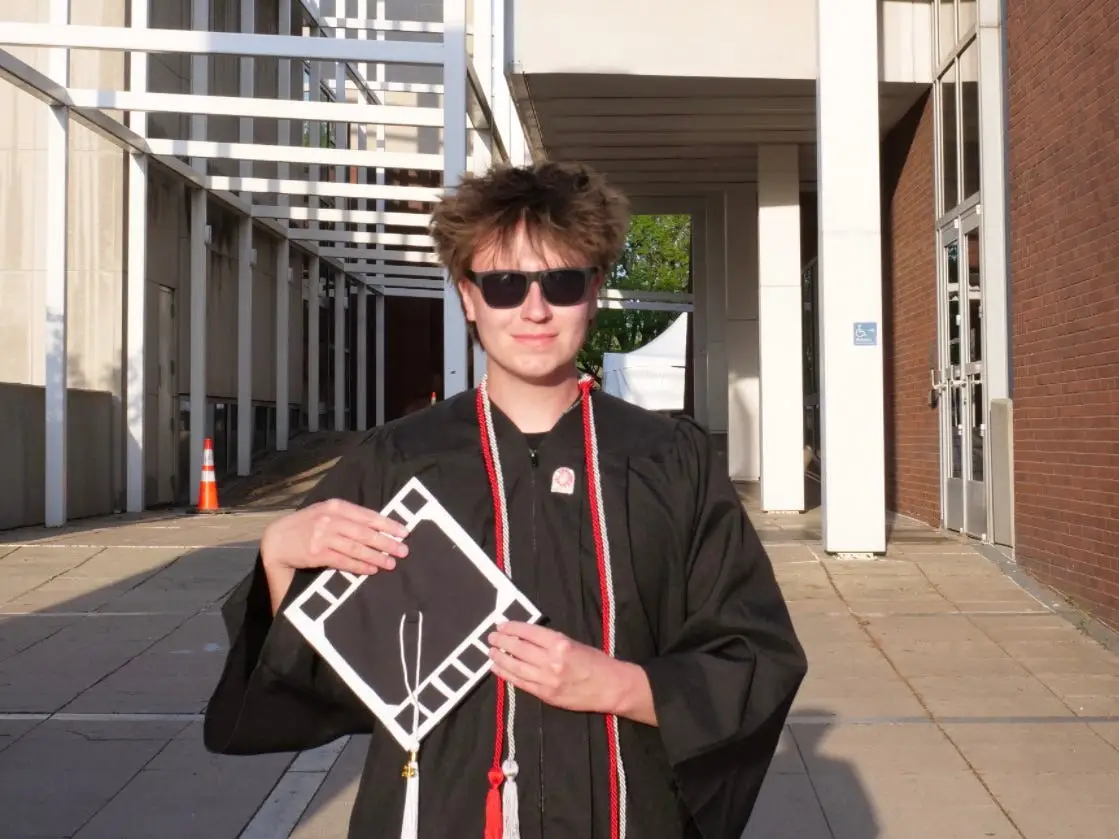 Sebastian Griffith in his college graduation gown