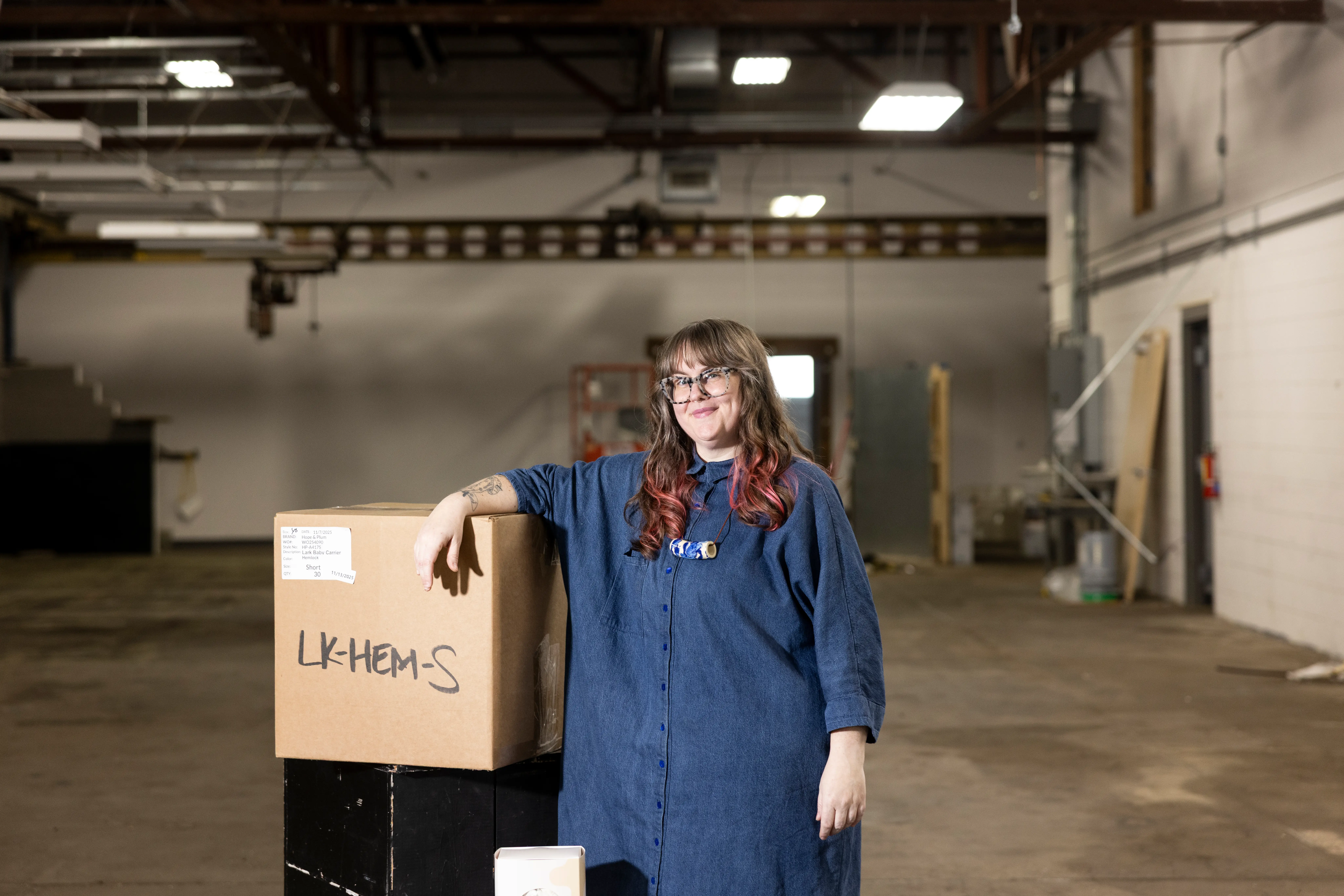 Mallory,  COO and cofounder of Hope&Plum, inside their new warehouse in MN.