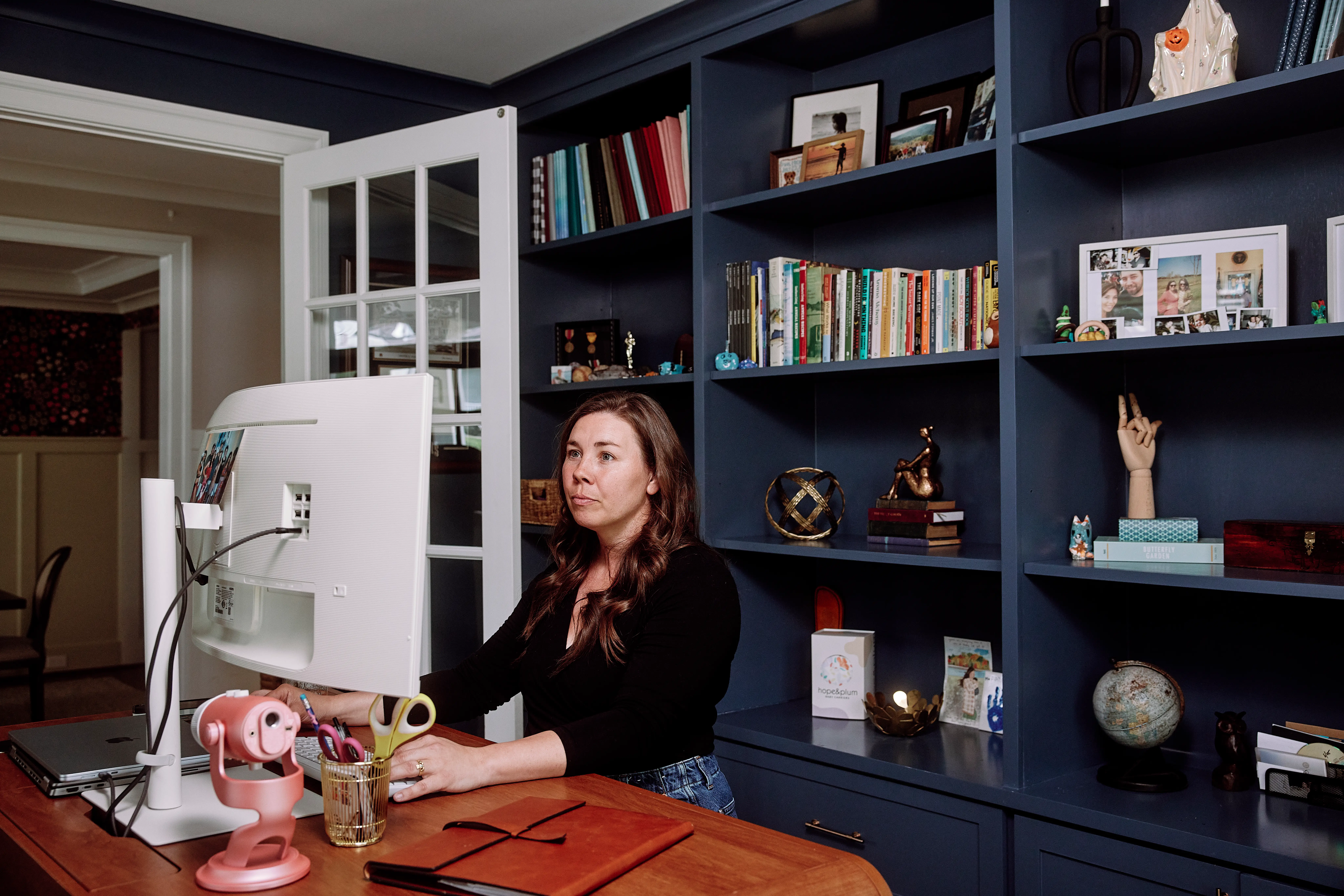 Skye at her desk, working from her home in MD.