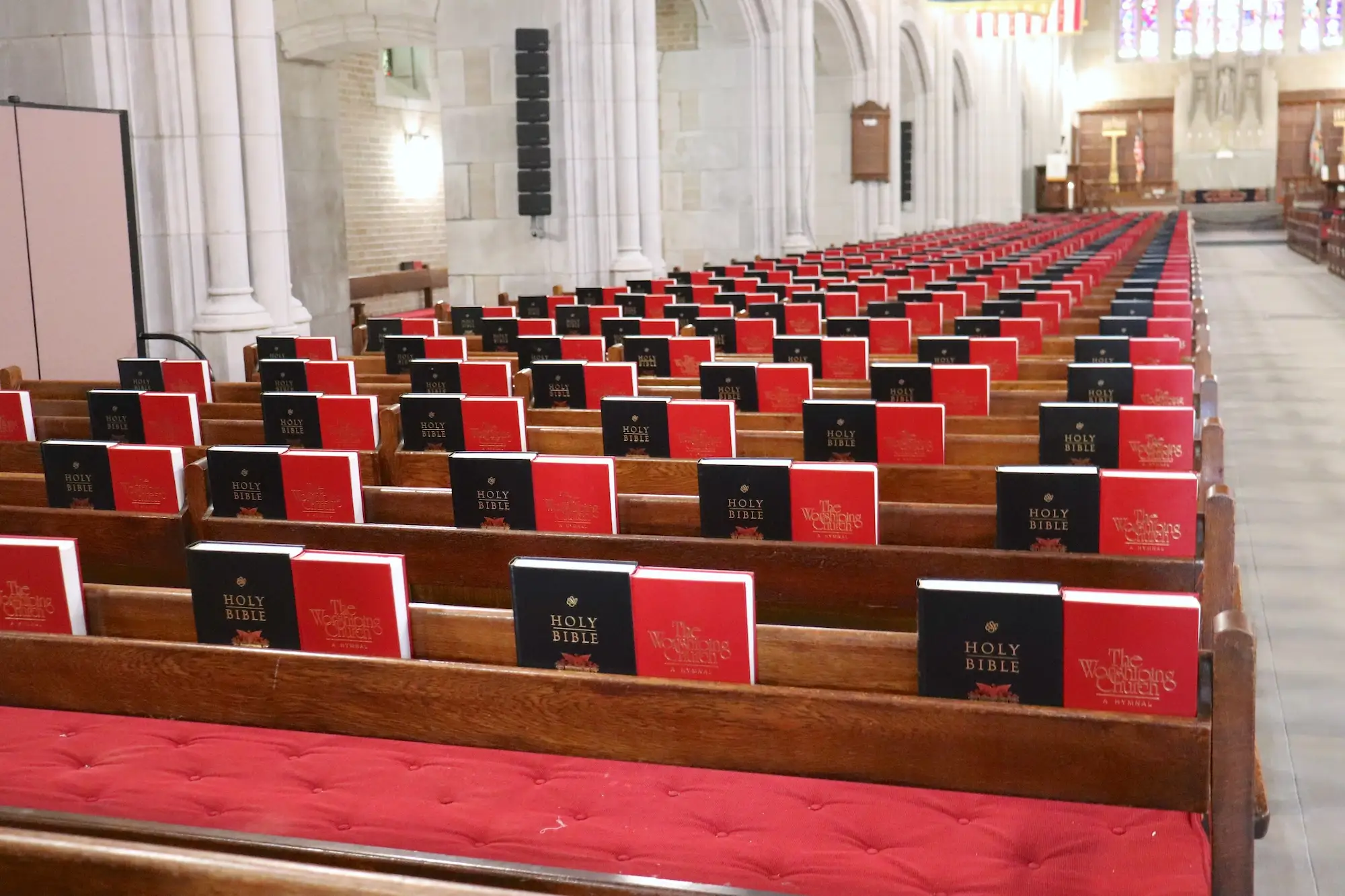 Bibles and hymnals in the pews of the Cadet Chapel.