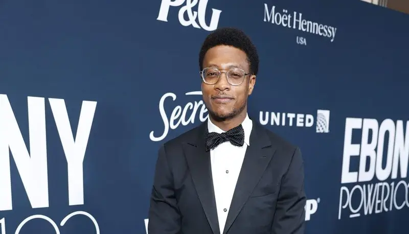 Damola Adamolekun in a tuxedo