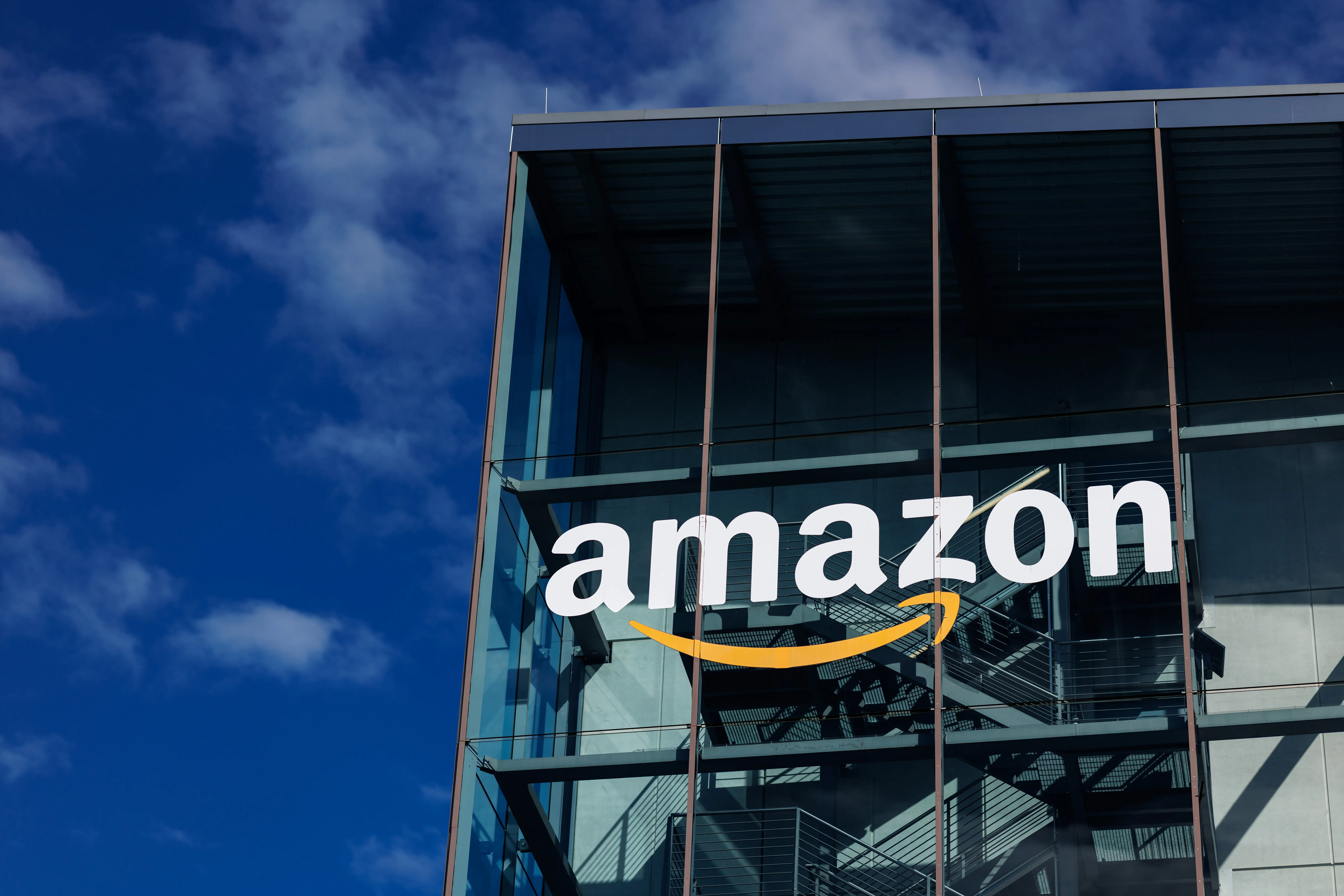 The logo and lettering of global online mail order company Amazon can be seen on the façade of Amazon Germany's headquarters in Parkstadt Schwabing in Munich (Bavaria).